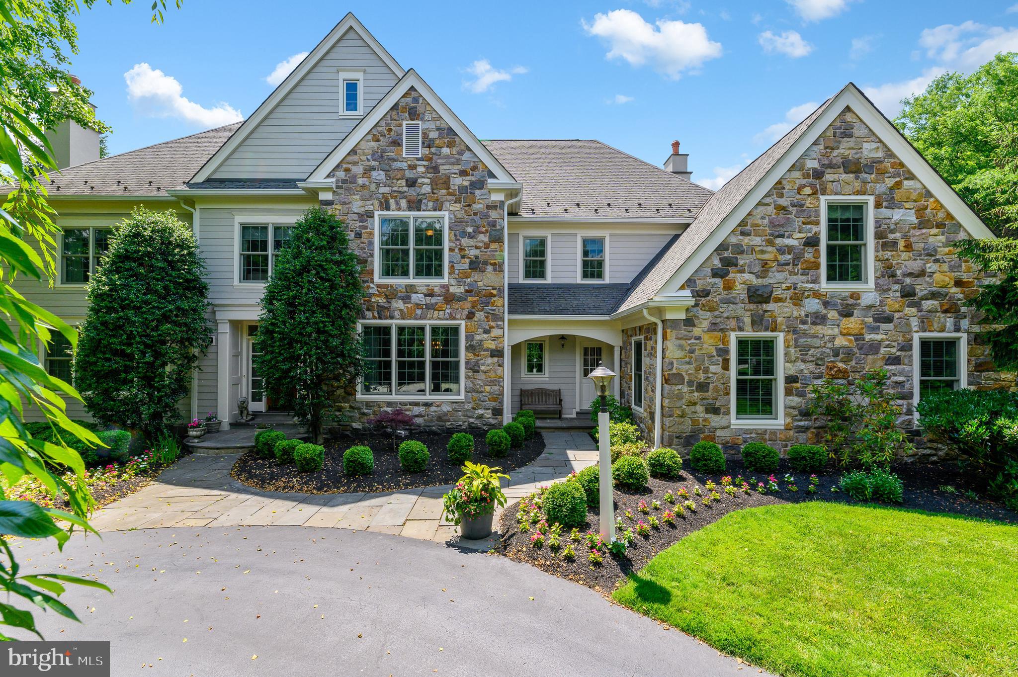 Welcome to 1460 Lanes End, Villanova PA, in the Pohlig built subdivision called Harriton Farm. If you are looking to be in the heart of Philadelphia s Main Line, look no further. This gorgeous and impeccably maintained stone and hardie board 5 bedroom 7 bathroom gem has been updated with all new windows and all new hardie board this year to make it feel like a brand new home. The approach as you drive down to the cul de sac is very private, and beautifully landscaped around the circular drive. A flagstone walkway leads to the grand, front to back foyer with a dramatic staircase. On the left is the formal Living room with fireplace, on the right, the Dining room with wainscoting. Toward the back of the home, next to the Formal powder room, you ll find the Study with built in bookcases and wainscoting.. Most of the living and gathering will take place in the large open kitchen with Thermador and Subzero appliances, and a Butler s pantry/wet bar with built in cabinetry. The perfectly situated Morning room with vaulted ceiling overlooks the backyard. Open concept Family room with fireplace and coffered ceiling. Finishing out the first floor is the Mudroom with wainscoting, powder room,And three car heated garage with extra laundry area, and wall storage organizer system. Just outside the front to back foyer, the large flagstone patio overlooks close to one acre of beautifully manicured lawn, which flows into the open space owned by the community. Mature trees and all day sun finish out the private back yard, an ideal spot to add a pool if you desire. Sonos sound system throughout the house and backyard and integrated wifi throughout the house. Irrigation system front and back keep the landscaping looking lush and green. The second floor landing leads you into the Master bedroom with a full sitting area, and two walk in closets. Full bath with Jacuzzi tub and double expanded vanities. Bedroom 2 with full bath, Bedroom 3 and 4 with Jack and Jill bathroom, Bedroom 5 with full bath.Upstairs Laundry room, Computer alcove, pull down Attic Storage and HVAC unit (2018) upstairs. The fully finished lower level has a TV room with dining area, fully bathroom, separate Playroom with sink and storage (Bar potential), Exercise room, unfinished area for storage, HVAC (2018) and tankless water heater. Other perks of this meticulous home include a Full house Kohler generator (2017), New 6 inch leaders and gutters (2018), Patio expansion (2017), HVAC system with air conditioners (2018) Hardie Board Siding with Azek trim, Jel Wen Windows all replaced (2020) Entire Interior painted (2020) Exterior painted (2020) Outside front landscaping with regrading (2020) New carpet Bedroom (2020) New security system (2020) Total recent upgrades in excess of $300,000. The lot premium on this spot was $100K more than the other when built because it backs up to open space.