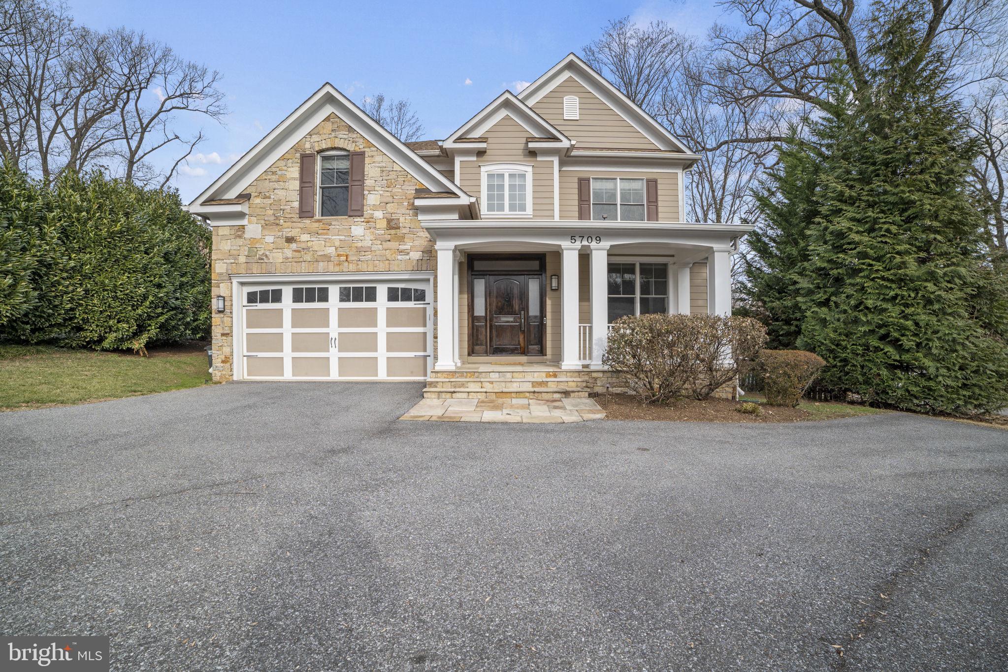Location! Custom built Craftsman Colonial with beautiful columned front porch.
Gourmet Kitchen with oversized island, double oven, gas range, butlers pantry, and dishwasher. Large family room with gas fireplace, formal dining, and living room. The Upper level has a spacious primary bedroom with walk in closet and full bath, there are three additional bedrooms, 2 full baths, and laundry room. The lower level has an additional bedroom, large family room, full bath, additional storage space, and walk out to back yard. Attached 2-Car Garage with EV charger compatible with level 2 chargers, patio, spacious driveway, and Owner will pay for lawn maintenance. Close to everything in downtown Bethesda!
