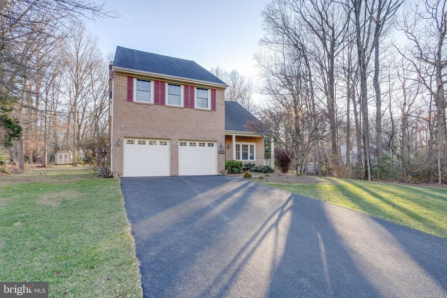 Welcome home to 4746 Holly Avenue, a charming colonial tucked away on over half an acre in the peaceful Birchtree neighborhood of Fairfax —a rare find in Northern Virginia.   From the moment you step inside, you’ll be drawn to the newly refinished hardwood floors and the vaulted living room ceiling with skylight, flooding the space with warm, natural light and creating an inviting first impression.

Designed for both everyday living and effortless entertaining, the formal dining room flows seamlessly into the kitchen, where granite countertops, a large peninsula with seating, and stainless steel appliances—including a new beverage fridge—make hosting a breeze. The kitchen opens to a cozy family room with a wood-burning fireplace, perfect for gathering on cooler evenings. Sliding glass doors lead to a screened porch, extending your living space outdoors and overlooking the serene backyard.

Step outside to discover your own private retreat: a deck and luxurious hot tub, thoughtfully tucked behind mature trees for privacy—ideal for unwinding after a long day or entertaining under the stars.

Upstairs, the expansive primary suite impresses with vaulted ceilings, multiple closets, and an updated ensuite bath featuring a spacious walk-in shower and double-sink vanity. Three additional bedrooms and an updated hall bath complete the upper level. The finished lower-level rec room offers generous space for movie nights, game days, or a home gym, while the large utility room provides excellent storage. A two-car garage adds even more convenience for vehicles, bikes, and outdoor gear.

All of this is located within the highly sought-after Woodson High School pyramid and just minutes from Route 29, Fairfax County Parkway, I-66, Wegmans, Costco, and the shops and dining at Fairfax Corner.

This is Northern Virginia living at its best—space, privacy, and location all wrapped into one special home.