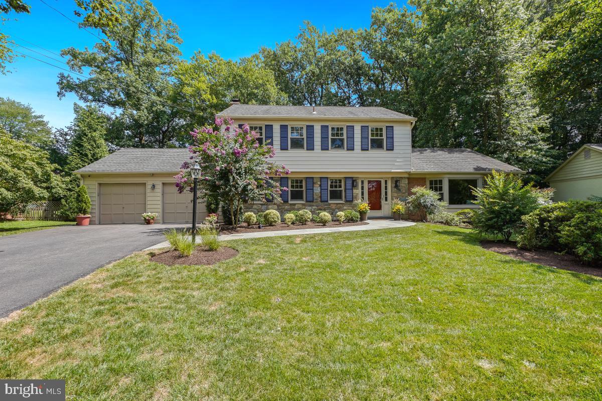 **OPEN SUNDAY, AUGUST 24, 1-3 PM***EXCEPTIONAL LUXMANOR/TILDEN WOODS GEM! IST TIME ON THE MARKET/ORIGINAL OWNERS! SOPHISTICATED & ELEGANT, CLASSIC & STATELY, 4 BDR/2 FULL/2 HALF BATH COLONIAL IN HIGHLY SOUGHT AFTER LUXMANOR/ TILDEN WOODS! LOADS OF UPDATES/ TURN KEY READY! BOASTING A LARGE FLOORPLAN W/ OVER 3,300 SQ. FT. OF TOTAL FINISHED LIVING SPACE, WHERE LUXURY AND CASUAL LIVING PERFECTLY CONVERGE!
This fine residence is ideally nestled within a quiet tree lined residential neighborhood! Undeniable curb appeal lures you to further explore the property and home and all it has to offer. INTERIOR SPACES: Generous interior spaces flow with ease making the home feel unified, spacious and grand while transitioning effortlessly! Loads of natural light throughout! MAIN LEVEL: Featuring an overflowing and generous "traditional" floor plan that includes; a fabulous family room w/ wood burning "stone" fireplace, large updated eat-in Gourmet kitchen w/ stainless steel appliances and newer cabinetry, living and dining room areas, large bay windows, 1/2 bath, study w/ built-ins make this ideal for casual family living and spirited entertaining! Gleaming newly refinished hardwood & fresh designer paint throughout, wood burning stone fireplace, updated Marvin windows, newer roof (approx. 8 years old), Carrier HVAC (approx. 8 years old) recessed lighting and custom cabinet built-ins create a comfortable home environment. French doors in family room open onto a glorious landscaped private back garden setting! UPPER LEVEL: Includes a large primary bedroom w/ updated ensuite w/ shower and walk-in closet. Three additional abundant sized bedrooms, full bath w/ tub and loads of closet space in all rooms. LOWER LEVEL: Fully finished lower level includes a super large "newly carpeted" recreation room w/ 1/2 bath, additional closet space, adjoining finished "all purpose room" w/ workbench, full laundry, utility area and a vast abundance of closet space! GARAGE: Large 2-car garage w/ two separate doors, small workshop area and additional storage. EXTERIOR SPACES: The gardens are a nature lovers delight and the crowning glory to this exceptional property! Stunning, richly landscaped, partially treed 21,100 sq. ft. (.48) acre lot! A gardeners dream! Semi-private setting! Mature plantings and trees abound! Very tranquil and serene! A blaze of azalea glory in the Springtime! The glorious fenced back yard includes a professionally landscaped garden, expansive lawn and exceptionally large patio, all making the outdoor space ideal for a myriad of family activities as well as joy for the consummate gardener. LOCATION: PRIME LOCATION- CENTRALLY LOCATED- DOESN'T GET BETTER THAN THIS! Close to all amenities including nearby SCHOOLS; Luxmanor Elementary, Tilden Middle School and Walter Johnson High School (w/ the soon to re-open Woodward High School {CURRNETLY A HOLDING SCHOOL} (check w/MCPS). Two METRO stations: Grosvenor and White Flint, Shriver Aquatic Center (re-opening in 2026) , vibrant Pike & Rose, Montgomery Mall, the Wildwood and the Cabin John shopping centers, Strathmore Hall, the Rockville Pike corridor w/ numerous restaurants, shopping, theatres, entertainment, the nearby Bethesda Trolly Trail, the Cabin John Park, and a short drive to downtown Bethesda, Kensington & Rockville as well as the C & O Canal. Just minutes to I-270 and the I-495/Capital Beltway! The perfect place to call home!