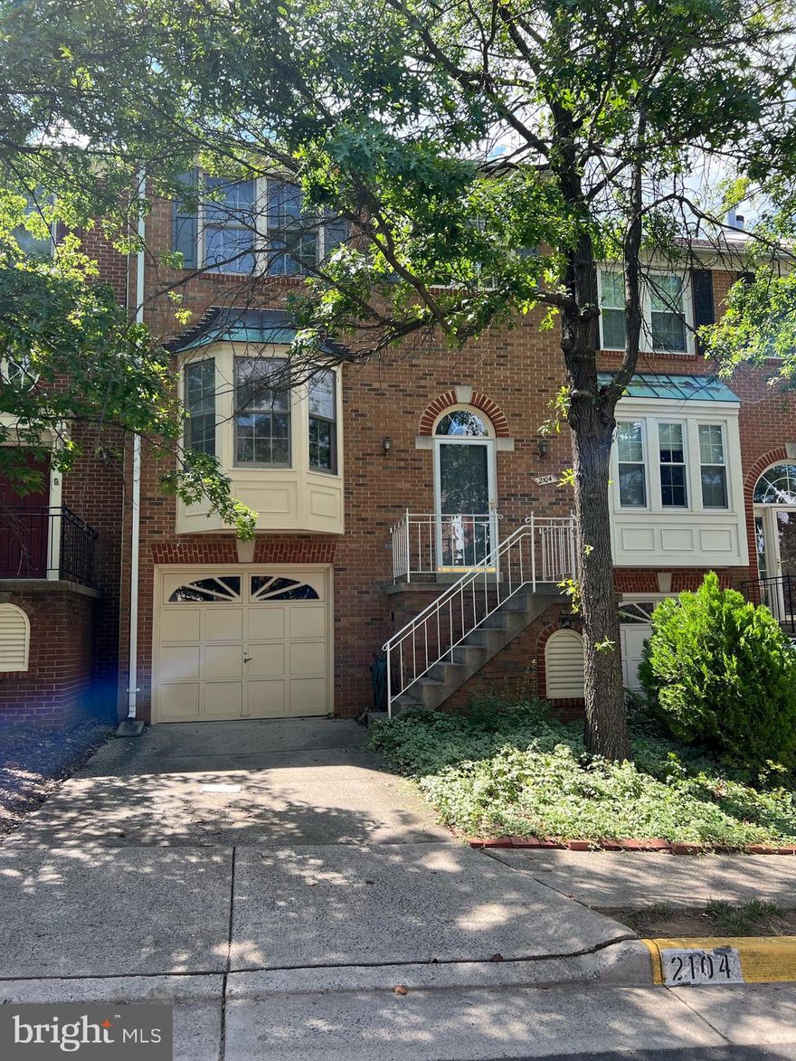 ** Delightful, well-built 3 Bedroom, 2 full bath plus 2 half bath brick front townhouse just minutes from Tysons ** Newer Carpet ** Spacious rooms **Hardwood Floors in Living Room and Dining Room ** Large 19' kitchen with Ceramic tile floor, refrigerator, double oven and separate gas cooktop with grill attachment, peninsula island, recessed lights, lots of cabinet space, bay window and  breakfast nook **  Atrium door from Dining Room to 20' deck ** Double sided Gas log Fireplace between Living Room & Dining Room ** Dramatic Cathedral Ceiling in 17' Primary bedroom suite with Walk-in Closet & Private Bath (Jetted Jacuzzi tub, separate shower, double sinks, and newer tile floor) ** Inviting Recreation Room with Gas log Fireplace and atrium door to rear yard ** 1 car Garage with separate 8'x7' locking storage room ** Driveway space for 1 additional car **  /// Sorry, no pets and no smoking ///