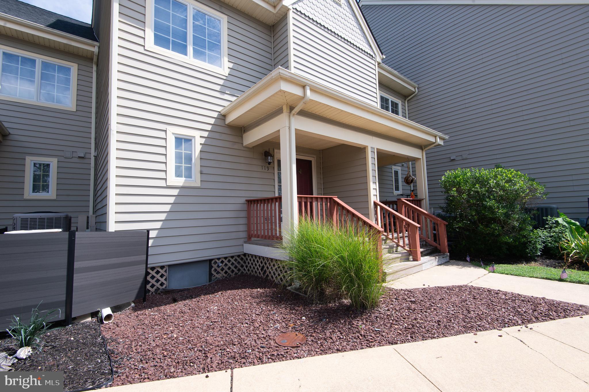 Riverfront Townhome with Private Boat Slip on the Warwick River! Welcome to your waterfront retreat at 101 Main Street Unit 119—this stunning 3-level townhome offers direct river access, a private boat slip, with a full-length pier just steps from your door. Enjoy quick boat rides to the Choptank River and Chesapeake Bay for world-class fishing, waterfront dining, and breathtaking scenery. The main level features an open floor plan, Kitchen with a pass-through to the dining room. The open-concept dining and living room featuring a wood burning corner fireplace leads to a private deck perfect for outdoor dining and relaxing with stunning river views. A private storage shed adds convenience. Upstairs, the Primary Suite offers a private river-view balcony, a full bath, including a makeup area, and double closets. A second bedroom, an additional full bath with , and laundry area complete the second floor. The top-level loft is a sun-filled third bedroom with panoramic views and a spacious storage room.. Recent community improvements include Bulkhead, Boardwalk.and roof. Maintanance free living included in Condo fees includes lawn care, trash service, outside building maintenance, water and electric at your boat slip. Enjoy your own private marina lifestyle—each unit has a dedicated boat slip with water and electricity, plus an additional visitor slip. A community boat ramp is just around the corner with ample parking. Located minutes from downtown Cambridge’s shopping and fine dining, and just a short boat ride to the Hyatt Regency Chesapeake Bay Golf Resort, Spa, and Marina. Only an hour’s drive to Ocean City for beach and boardwalk fun!