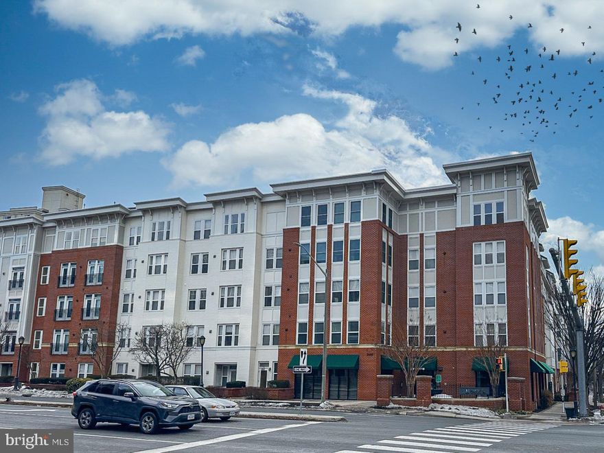 Wonderful 2nd-floor end-unit with windows on 2 sides for a spacious, more open feeling. The elevator is just outside the door for quick access. Dunn-Loring Metro is across the street, along with a plethora of shopping (Harris Teeter, Starbucks, Lazy Dog Cafe, and many, many others) all within 1-3 blocks away. Plus, the 'Mosaic District' is about a half mile away. Easy access to I-495 & I-66. Home comes with 1 covered parking spot in the building's garage. Carpet is less than 2 years old, a new refrigerator was installed in 2025, and the building just had a new roof installed. Building comes with multiple event rooms, a fitness room, a basketball court, a conference room, and an outdoor swimming pool.