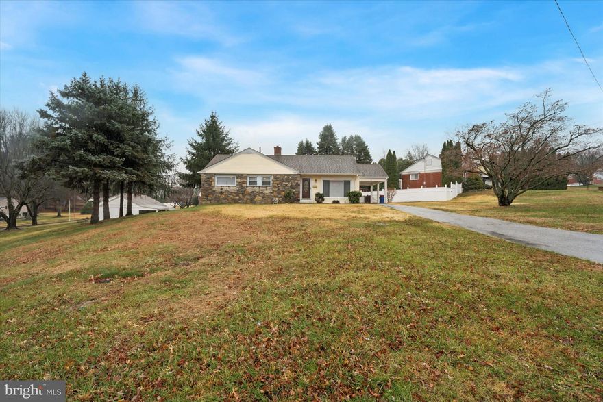 Welcome to this beautifully maintained brick and stone ranch home set on an expansive corner lot offering exceptional space, privacy, and endless possibilities. With large front, side, and rear yards, this property delivers the outdoor room you’ve been searching for.
This home offers single level living with three comfortable bedrooms, nice full hall bath and primary private powder room. The bright eat-in kitchen is ideal for casual meals, and the layout offers a great flow for everyday living.
The unfinished basement provides a clean slate—ready to be transformed into additional living space or whatever suits your needs.
Parking is never an issue with off-street parking for 4+ cars, plus a carport for added convenience.
This home also brings fantastic expansion potential, whether you choose to add a second floor or build out from the side or rear. The solid construction and large lot make these options both realistic and exciting for future growth.  
You’re also close to everything that matters: schools, playgrounds, shopping, restaurants, major highways, and an easy commute to the city. With central air, public water, and public sewer, the essentials are already in place.