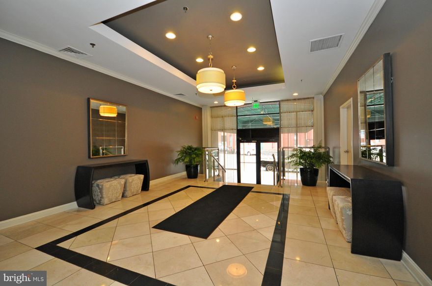 Desirable condo in the heart of Fell's Point. Enjoy 2-CAR GARAGE PARKING, fitness center, outdoor pool & 24-hr security.Nice open floor plan w/great storage & space for housemates. Updated KIT w/SS appl & Corian counters; upgraded washer/dryer; recent carpet, windows & AC; neutral paint (not shown in photos). No pets. No smoking. Avail 7/1/16.