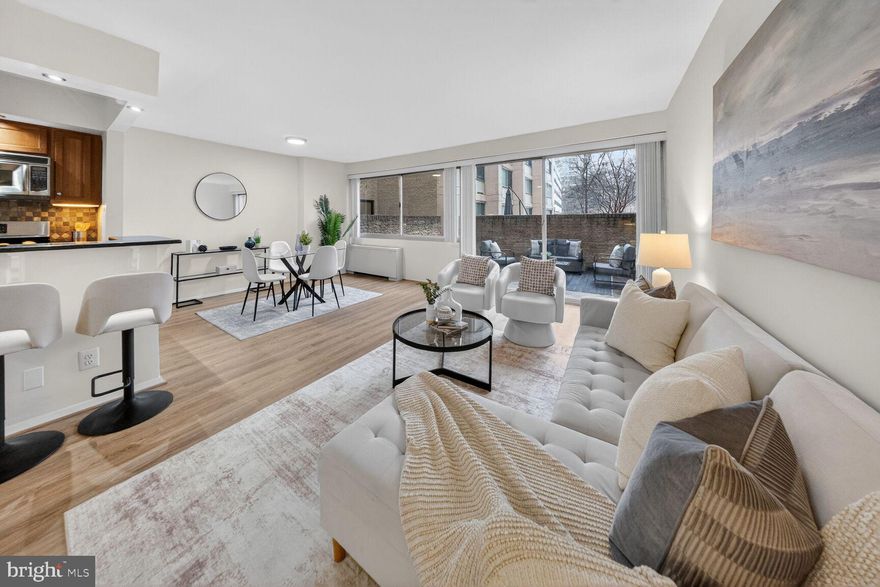 Open  Sun 5/17 10-12 PM **Seller is offering 6 months prepaid condo fees.** Best value with patio and parking! 

Step into the epitome of chic, modern living with this stunning high-rise treasure at The Willoughby—featuring one of the most sought-after one-bedroom layouts. With nearly 900 square feet of thoughtfully designed open living space, this gem is perfect for buyers and investors alike.  

Let’s talk about that patio: over 200 square feet of private outdoor bliss, ideal for morning coffee or hosting cozy alfresco evenings. Inside, you’ll find an open floor plan brimming with upgrades, including a sleek, updated kitchen with stainless steel appliances, a wine fridge, and brand-new luxury vinyl plank flooring. Freshly painted walls, updated lighting, and a stylishly modernized bathroom add to its polished charm, while a spacious walk-in closet ensures plenty of storage. And thanks to a wall of windows, natural light pours in, creating a warm, inviting vibe throughout. Laundry facilities? Just steps from your door for ultimate convenience.  

Living here means effortless style and ease. Your condo fee covers all utilities, while the building spoils you with amenities galore: 24/7 concierge service, a rooftop pool and sundeck with jaw-dropping views, a fitness center, an on-site convenience store, a library, a party room, and even an in-house restaurant. Need to shop or commute? The complimentary building shuttle has you covered.  

And the location? Absolutely unbeatable. Just steps to Friendship Heights Metro, Whole Foods, Trader Joe’s, Amazon Fresh, Bloomingdale’s, and a lineup of renowned restaurants like Clyde’s, Lia’s, and The Capital Grille. Whether you’re savoring Chevy Chase’s vibrant dining and retail scene or embracing the freedom of a lock-and-leave lifestyle, this condo delivers it all.  

Complete with secure garage parking and a warm, welcoming community, this home is ready to impress even the most discerning buyer. Don’t miss your chance to claim a slice of modern elegance in one of the area’s most desirable high-rise communities. This isn’t just a home—it’s a lifestyle upgrade waiting for you!