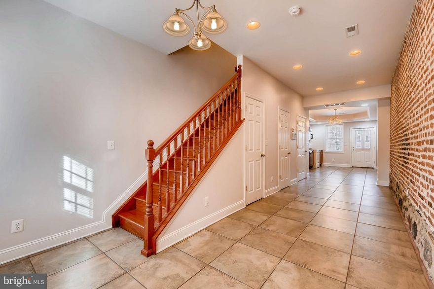 What a beautiful place to call home! Take a walk at Patterson Park and enjoy hosting your friends at the open layout of this home, with each own  driveway, conveniently located minutes from stores, restaurants, Patterson Park and major highways.