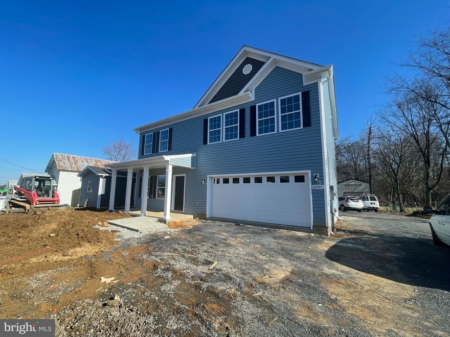 Brand new home, five bedrooms, three full baths, with engineered flooring on the main level.  A first-floor bedroom with a full bath on the main level.   Granite in kitchen and all baths, carpet in all bedrooms
Includes a two-bedroom mobile home with a laundry room & an oversized detached workshop with separate electricity.