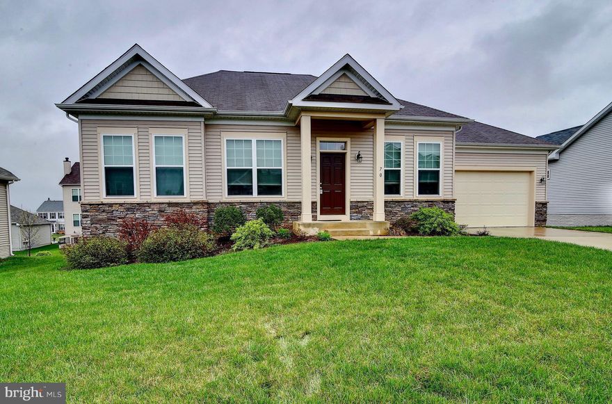 The "Lewis" model is a modern touch on a classic main level master floorplan - open living room w/gas FP, breakfast room & KT; formal DR & den. Granite counters, 42 inch cabinetry, ceramic tile flooring. Fully finished basement w/ rec room, bedroom, full bath, & workshop w/ built-in storage.  2-car garage, stone accenting on exterior. Awesome screened-in porch. This home is in excellent condition!