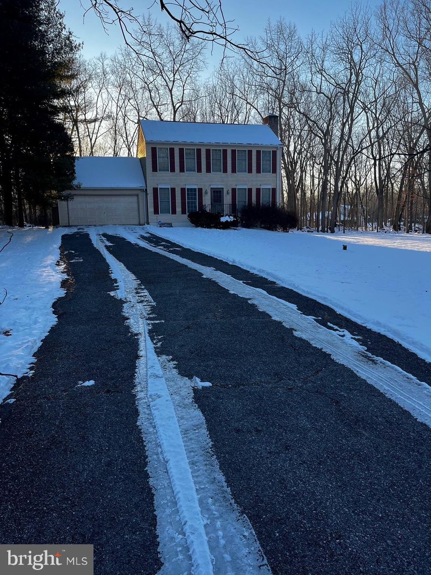 This 2 acre 7 room Colonial home located in a quiet neighborhood on a cul-de-sac is AS IS it needs a little TLC.  It needs a new roof and  back deck, but the house is a well built house with 3 bedrooms 2 and 1/2 baths. Large Dining Room,  Living Room with a fireplace that has a heatilator,  Kitchen with a Dinette Area and Laundry Room off of the Kitchen with a door to go into the garage. Extra Room could be used as a TV Room or an Office.  Half of the basement is finished and a place you can install a woodstove and the other half is a great workshop with an outside entrance, the garage has built in shelves, closet, and an extra stove for extra cooking.  This house is in a Great location.   You are only 3 miles to Shepherdstown and about 4 miles to I 81.   It is priced to move, Come see you will be amazed.