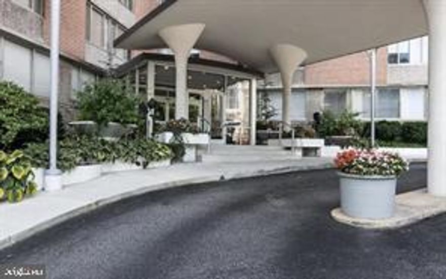 REDUCED PRICE: NEWLY RENOVATED!! This is a unique 1st floor unit is move-in-ready for your business needs. Currently approved for "non conforming use" for your Office Space / medical practice. Unlike typical units, this one has its own 2 parking places and side entrance w/ ramp! Was setup as a doctors office but now open to all businesses. 1st floor laundry room, 24hr front desk service, community room, pool, & exercise room. Convenient corner location for easy client/customer access! $1110.00 rent plus $890  Condo fee =$2000.00 All utilities included
