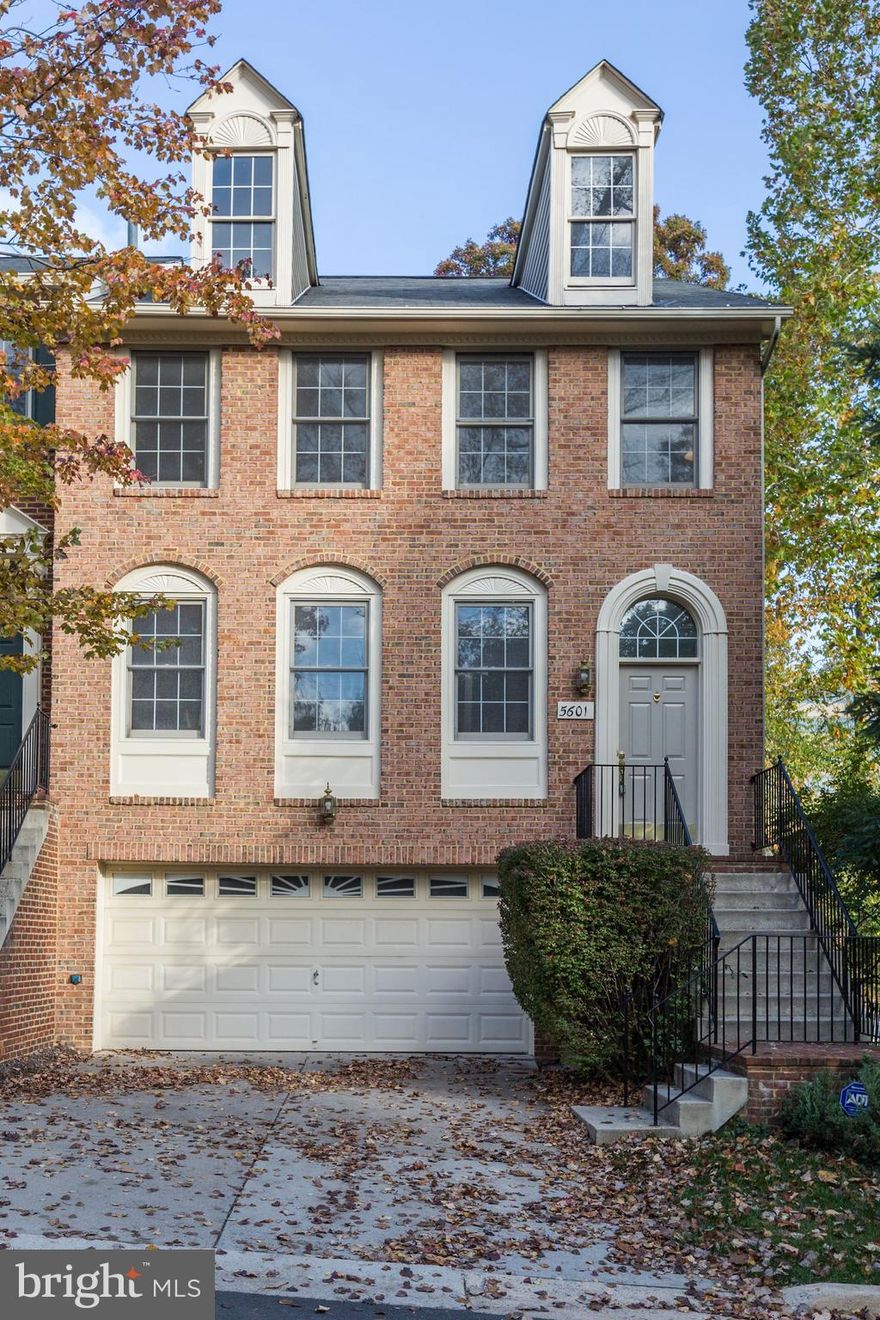 GORGEOUS BRICK FRONT END UNIT TOWNHOME IN A FABULOUS LOCATION.  THIS HOME FEATURES AN EXPANSIVE FAMILY ROOM WTH GLEAMING HARDWOOD FLOORS, HIGH CEILINGS AND WALLS OF WINDOWS.  AN OPEN CONCEPT FLOOR PLAN MAKES ENTERTAINING A DREAM.  LARGE KITCHEN WITH GAS COOKING AND UPDATED APPLIANCES. THE  KITCHEN CONTAIN PLENTY OF CABINETS WITH LOADS OF STORAGE.  ENJOY THE  BREAKFAST AREA  AND SEPARATE DINING ROOM WHICH INCLUDES DOORS LEADING TO THE DECK FOR PERFECT OUTDOOR ACCESS.  FROM THE GRAND STAIRCASE LEADING TO THE UPPER LEVEL,  YOU WILL FIND THE PRIMARY BEDROOM WITH VAULTED CEILINGS AND A SPA LIKE BATH , SOAKING TUB PLUS SEPARATE SHOWER.  A LARGE WALK-IN CLOSET PROVIDES AMPLE SPACE TO ROUND OUT YOUR LUXURY EXPERIENCE.  TWO ADDITIONAL LIGHT FILLED BEDROOMS CONTAIN ABUNDANT  CLOSET SPACE AND TALL CEILINGS.  THE SECOND  FULL BATH AND OVERSIZED HALLWAY COMPLETE THIS LEVEL.  A LARGE RECREATION AREA WITH FIREPLACE,  SEPARATE LAUNDRY ROOM AND THIRD FULL BATH ARE LOCATED IN THE LOWER LEVEL.   WALK OUT TO THE PATIO AND FENCED YARD FOR ADDITIONAL OUTDOOR EXPERIENCE.  THE FRONT LOAD 2 CAR GARAGE AND DRIVEWAY OFFER CONVENIENT PARKING.  THE FALLSTONE COMMUNITY IS CLOSE TO SHOPPING , COMMUTER ROUTES AND TRANSPORTATION.