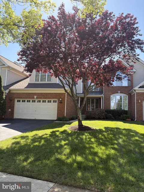 Photo of 5670 Wheelwright Way, HAYMARKET, VA 20169 (MLS # VAPW2119494)