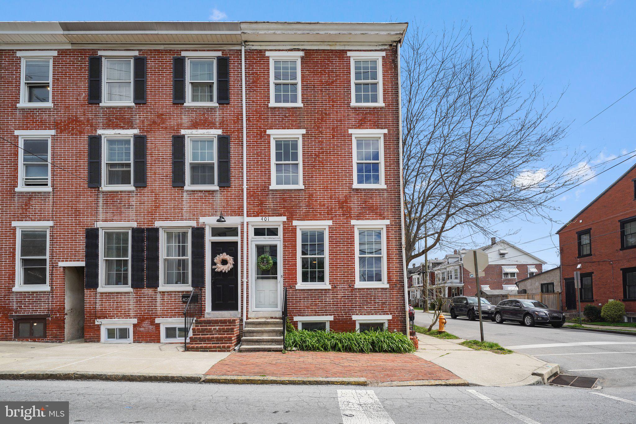 Brick end unit home in the heart of West Chester! Don’t miss this opportunity to own a charming 4-bedroom, 2.5 bath end unit home nestled in the highly sought-after West Chester Borough, within the award-winning West Chester Area School District. Located in a prime location from downtown dining, shops, and parks, this home perfectly blends historic character with modern convenience.
Inside, you’ll love the exposed brick details, spacious layout, and natural light throughout. The main floor offers an updated kitchen with new cabinets, granite, stylish backsplash and new appliances. The large living room and dining area are great for entertaining. The main floor also has a convenient mudroom with laundry, a renovated half bathroom and access to the backyard.
Up the brick exposed staircase are three sun filled bedrooms and a convenient full bathroom. The third floor has an expansive fourth bedroom with a new full bathroom with custom walk-in tile shower and modern fixtures.
Outside, enjoy a fully fenced yard—ideal for pets, play, or gardening—plus a detached garage for private parking or extra storage.
With its unbeatable location, charming features, and functional layout, this home is a true West Chester gem!