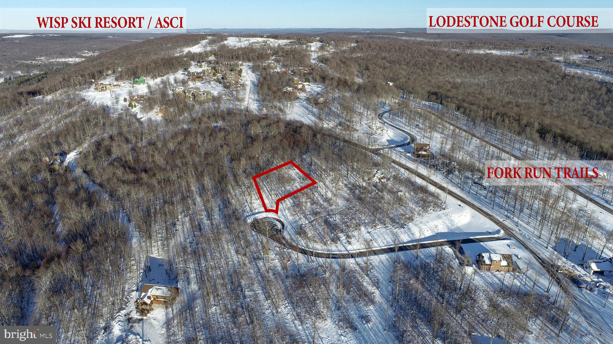 This 0.39-acre lot is located at the end of a quiet cul-de-sac in the heart of Deep Creek Lake. Backing directly to Wisp Resort property, it is just a short distance from the ski slopes and ASCI White Water Rafting, making it an ideal spot for outdoor enthusiasts and year-round recreation. The community also features an access path that leads directly into Fork Run Trail, a 550-acre network of hiking and biking trails. Lot 8 slopes gradually upward from the cul-de-sac, leading to a flatter area perfectly suited for building a home. This natural elevation enhances the stunning mountain and sunset views from the property. Even during cloudy or stormy weather, the fog lifting through the treetops and the lush greens of rain-soaked foliage create a serene and captivating beauty. No matter the season or weather, this property provides vistas that showcase the area’s natural charm. The North Camp Ridge community offers underground electric utilities, minimizing the risk of power outages, and has no streetlights to preserve the incredible night skies free of light pollution. It is one of the newest and most rapidly developed communities on Wisp Mountain. Known for its family-friendly atmosphere, easy accessibility, and scenic surroundings, this community has quickly become a sought-after destination for those seeking both tranquility and convenience. Public sewer and water are available for hook-up, making it easy to begin planning your dream retreat. Finding a builder will be your next step!