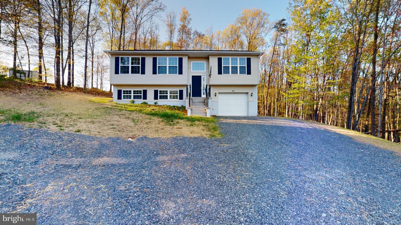 Charming plus location equals 96 Tahoe Drive! Postal address says Paw Paw but your right in Slanesville!
Welcome to this newly remodeled 3 bedroom 2 1/2 bath split foyer boasting new LVP floors throughout, brand new deck, and new kitchen! Great open floor plan with the dining area and living room right off the kitchen! The basement has been fully finished with brand new carpet and additional 1/2 bath! Come enjoy being off the beaten path but close to convenience stores, schools and town! Prefect commuter home in a quiet subdivision! ONLY 30 miles to Winchester VA! Keep an eye out for professional photos and the virtual tour!