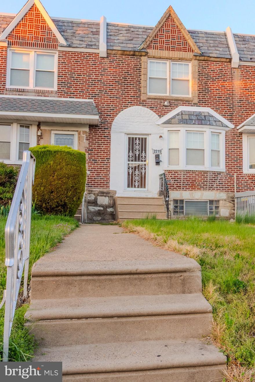 Welcome to 2219 Friendship Street, nestled in the heart of Philadelphia’s beloved Mayfair neighborhood. This inviting property blends classic charm with functional living, making it an excellent opportunity for homeowners or investors alike.

Step into a bright and spacious living room featuring hardwood floors and a seamless flow into the dining area—perfect for entertaining or everyday meals. The galley-style kitchen offers efficient use of space, with ample cabinetry, classic finishes, and easy access to the rear of the home.

Upstairs, you'll find three bedrooms with natural light and plenty of closet space, along with a full hall bath. The lower level features a basement with a quarter bath (toilet only), ideal for added convenience, a rec room setup, or even a home office. There's also a dedicated laundry area and access to the rear driveway.