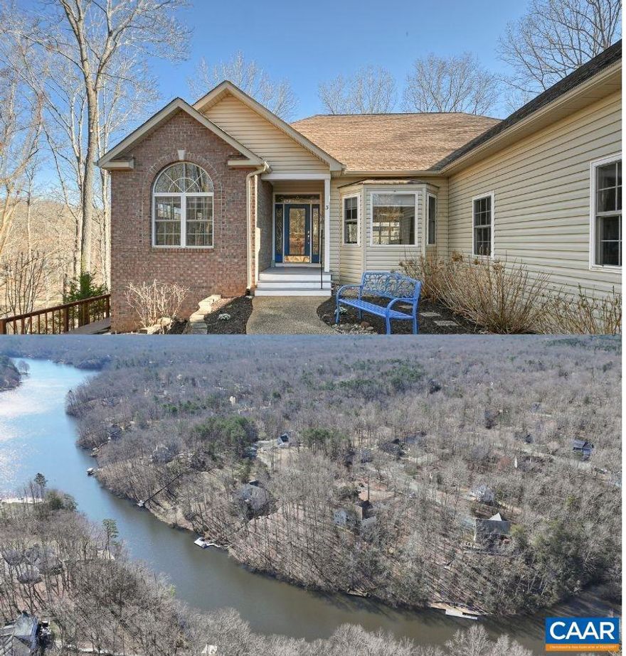 Beautiful WATERFRONT home (215 feet of water frontage) on a very quiet Cul-de-Sac. Ample square footage on an over one acre lot with beautiful landscaping and a private dock (with electricity). **Located in Lake Monticello's gated community. This private subdivision offers a golf course, beach, pool, parks, clubhouse, and more! Hardwood floors and an impressive living room with cathedral ceilings and a fireplace are the first things you see when you walk through the front door.  The large kitchen features granite countertops and solid oak cabinetry.This is a one owner home with top-of-the-line finishes throughout.  An open floor plan filled with abundant natural light allows the home to flow beautifully. There is also; a screened-in porch to enjoy views of the lake in any kind of weather,  a radon mitigation system (installed at the owner?s request) and a brand-new HVAC system (2021). The spacious portion of finished basement boasts a large wet bar, family room, and walk-out patio. Unfinished includes LOTS of storage space and an indoor workshop with built-in tool benches. This home has so much space for entertaining and will be the perfect place for family and friends to enjoy the lake life!,Granite Counter,Fireplace in Basement,Fireplace in Living Room