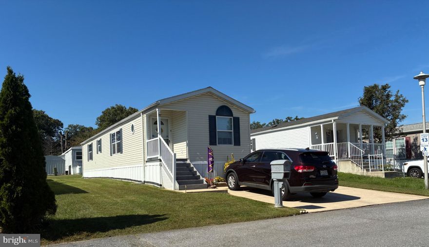 Discover the charm and comfort of this beautifully maintained manufactured home nestled in the convenientWilliams Estates community. Built in 2005, this Skyline Springbrook Supreme model offers a perfect blend of modern convenience and cozy living, making it an ideal choice for those seeking a serene lifestyle. Step inside to find an inviting open floor plan that seamlessly connects the living, dining, and kitchen areas. The spacious living room is adorned with neutral carpeting and features crown moldings that add a touch of contrast.Natural light floods the space through a skylight and well-placed windows, creating a warm and welcoming atmosphere. The flatscreen TV conveys. The electric fireplace is excluded.The kitchen is a spacious delight, equipped with essential appliances including a built-in microwave, self-cleaning oven, solid cooktop electric range, and refrigerator. Enjoy casual meals in the eat-in kitchen, complete with a pantry for all your storage needs plus laundry.This home boasts two generously sized bedrooms, each designed for comfort and relaxation. The primary suite features an ensuite bath with a stall shower and a skylight. The walk-in closet offers ample storage, making organization a breeze. The second bedroom is equally inviting, perfect for guests or as a home office. Additional interior features include ceiling fans for year-round comfort, built-ins for added convenience. Outside, enjoy the benefits of off-street paved parking for two vehicles, both a side and front Trex porch and a handy shed for extra storage. The Williams Estates community offers a peaceful environment, perfect for unwinding after a long day. This home is not just a place to live; it's a lifestyle choice that combines comfort, functionality, and community. With its excellent condition and thoughtful design, this manufactured home is ready to welcome you. Don't miss the opportunity to make this charming residence your own!
**PARK APPROVAL IS REQUIRED. Call Williams Estates/Peppermint Woods office at 410-686-0077. Current park rent is $1013.69 per month including water and sewer and trash collection and is due to change in December 2025. Please call their office to verify fees, and for any other approval questions.  Amenities: community center rentable for parties, guest parking at community center with Park permission in advance for your home parties, boat and camper storage for 25’ or smaller vehicles, exercise room, dog park, tot lot. (inquire at Park Office, as to any fees required for the above). 410-686-0077