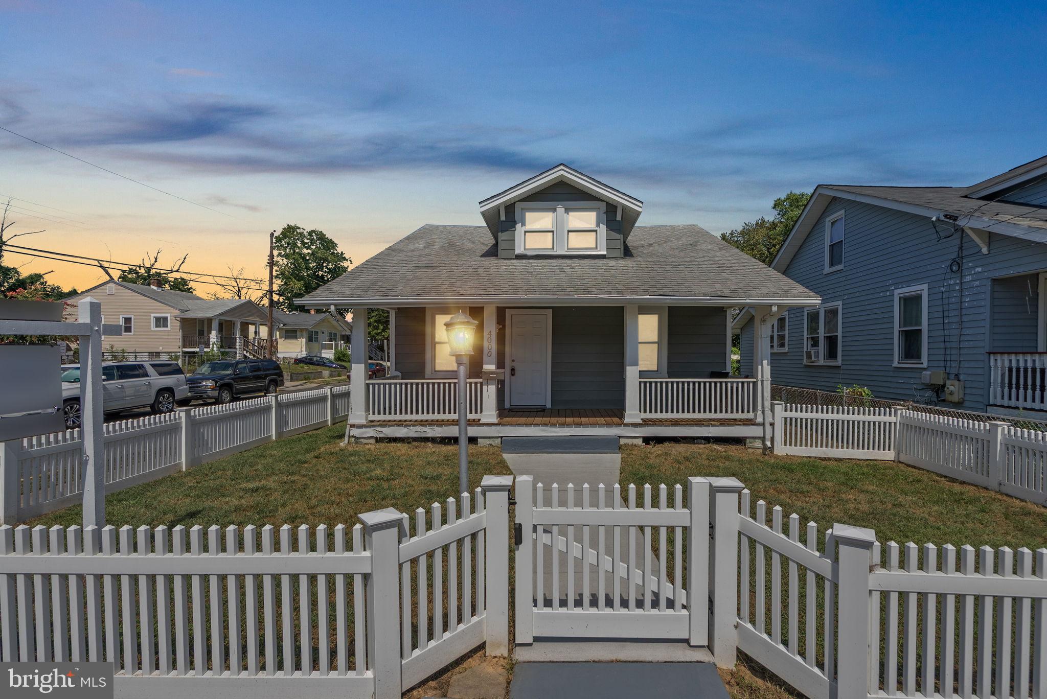 Beautifully renovated in 2024, this 4 bedroom, 2 bath Cape Cod features an open floor plan on a large corner fenced lot! This gorgeous home features recessed lighting and two full bathrooms with high end fixtures and custom tile work. The large kitchen has stainless steel appliances, quartz countertops and beautiful shaker cabinetry. The upper level offers a large owners suite and a huge walk in closet. The lower level offers another full bath, 4th bedroom with attached den, laundry room, and private access to the back yard. On the exterior, there is a newly built front porch, new rear concrete patio and a new oversized parking pad. This home is a commuters dream, offering easy access to Downtown DC and 295.