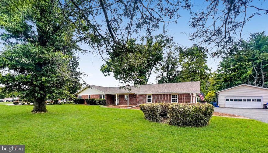 One of a kind setting and home. Situated on over 2 acres in Norbrook Village, this all brick one level living home has many upgrades and updates throughout. Renovated kitchen has tile floor, eat-in area, stainless appliances, under counter lighting, and granite counters. Renovated hall bath with tile and expanded shower with multiple water shower heads. Renovated primary bath with jetted tub and tile. Gleaming hardwood flooring throughout most of main level. New paint on main level. Entertain this fall in the massive screened patio with 2 ceiling fans. 4 car garage parking with detached garage. Finished lower level with room for bedroom, theater room, work out room, office and so much more. Tons of storage. EXTRAS: generator, whole house fan, lots of windows throughout, wood stove in living room, new carpet, and extra large driveway. Located just north of the ICC (get to 270 or 95 in a flash) and south of downtown Olney, Great access to Olney Manor Park and Swim Center, Roots grocery store, golf park, and so much more.