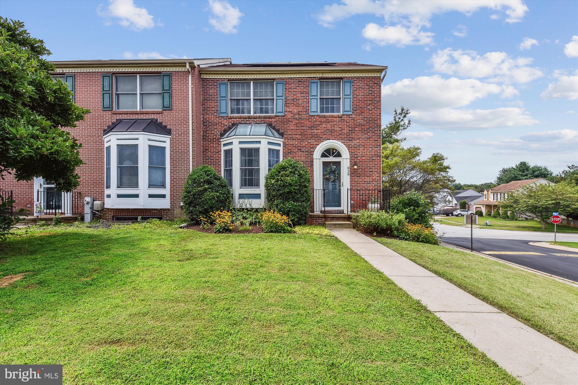 Welcome to this beautifully maintained 4-bedroom END OF GROUP townhome featuring a classic brick front and a private fenced yard, perfect for relaxing or entertaining. Special Features Include: Gleaming hardwood floors in the bright and airy living room, updated kitchen with center island, granite countertops, and modern finishes. Access to outdoor living by way of sliders to the deck. Two full baths on the upper level for added convenience, primary suite with soaring vaulted ceilings, a updated primary bath with double vanity. The lower level is fully finished, offering flexible space for a recreation room, home office, or optional 4th bedroom. It also includes a dedicated space with plumbing rough-in, making it easy to add an additional bathroom. Water heater updated in 2020. Trane Heat Pump. Save money on your electric bill with the solar panels that are already in place. Just pick up the solar lease to continue use. Conveniently located near commuter Route 543, this home offers easy access to shopping, dining, and major highways. Don't miss your chance to own this spacious and stylish townhome in a sought-after location!