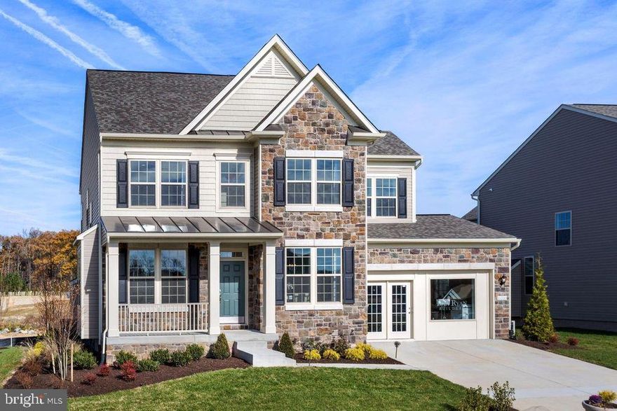 Welcome Home!  You will be the first family to live in this Beautiful spacious BRAND NEW MODEL HOME!  This 4 Bedroom, 3.5 Bath located in new Glen Dale Crossing boasts custom upgrades that you must see to believe!   First floor with gleaming  wood floors througout. Kitchen w/ stainless steel appliances, solid plywood cabinets, self-closing drawers, and granite countertops! Table space in kitchen and also a formal separate dining room. 2nd floor with upgraded carpet. Cozy gas fireplace in living room. Master bedroom w/ TWO walk in closets and HUGE master bath with tile surround soaking tub and separate shower. Other 3 bedrooms are very nice sizes! All bathrooms have porcelain tile floors & tile surrounds.  Lot's of natural light from the many new windows throughout home.  Large Fully finished basement.  Surround sound speakers set the mood for your next gathering.      Close to New Carrollton and Greenbelt METRO & buses. Tot playground across street! Immediate Move In!!