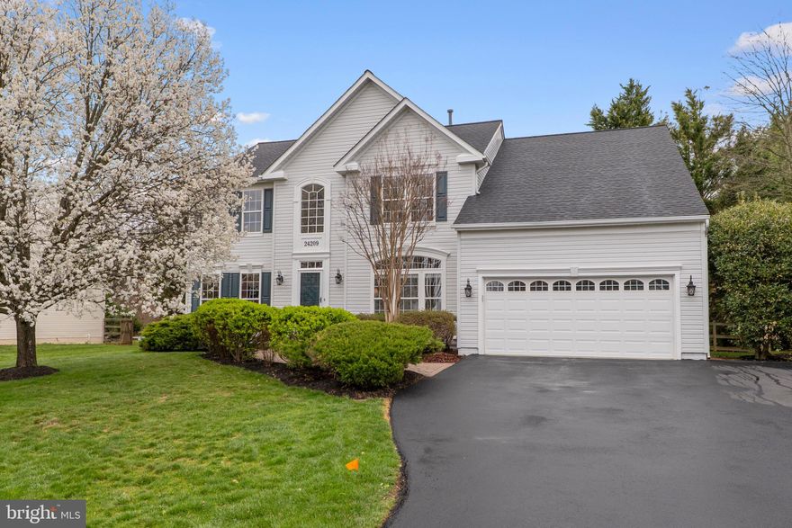 Nestled in the charming Kings Valley Manor community, this beautifully maintained Colonial offers over 4,000 square feet of finished living space on a private 0.57-acre lot backing directly to protected wooded conservation land. Ideally located near the crossroads of Damascus and Clarksburg, this home combines space, comfort, and convenience with easy access to I-270, shopping, dining, and outdoor recreation.

A dramatic two-story foyer welcomes you into a warm and inviting interior featuring crown moldings, fresh paint, and solid hardwood flooring throughout the main level, upper hallway, and staircase. The thoughtfully designed main level includes a private home office and a spacious family room anchored by a gas fireplace and accented by transom windows that fill the space with natural light while showcasing serene wooded views.

The eat-in kitchen is both stylish and functional, offering 42” white solid wood cabinetry with soft-close doors, granite countertops, stainless steel appliances, recessed lighting, and a center island—perfect for everyday living and entertaining. A formal dining room provides an elegant setting for gatherings, while main-level laundry adds everyday convenience.

Upstairs, the expansive primary suite serves as a peaceful retreat, complete with a renovated en-suite bath featuring dual vanities, a soaking tub and a separate stall shower. New carpet in the bedrooms enhances comfort, while additional baths have been updated with LVT flooring and modern finishes.

The fully finished basement expands your living space with a full bath, abundant storage, and flexible areas ideal for a recreation room, home gym, theater, or guest accommodations.

Outdoor living is equally impressive, with an oversized paver patio overlooking the fully fenced, landscaped backyard and tranquil conservation area, providing exceptional privacy.

Major system updates include a roof replacement (2019) with architectural shingles and a 50-year transferable warranty, dual-zone HVAC (attic heat pump replaced in 2020 and basement system in 2017), and updated water heater, sump pump, and radon fan (2018). The driveway was repaved in 2025 and recently sealed.

Situated on a quiet no-thru street in a desirable community with limited turnover, residents enjoy access to common grounds and nearby parks, including Magruder Branch Stream Valley Trails and Damascus Recreational Park. This exceptional home offers the perfect blend of privacy, modern updates, and community charm.