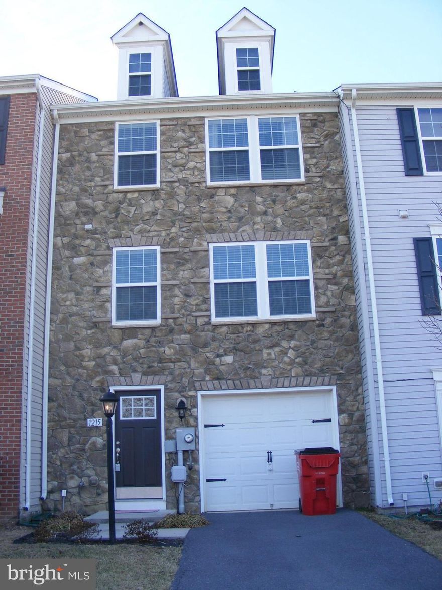 Conveniently located townhouse with huge master bedroom and finished basement.  Wide slat blinds provided.  Large deck off extended family/dining area.  Large closets with built in shelving.  Two full baths on top level. Powder room on main level and powder room and laundry on lower level. Pets case by case. Playground & extra parking.