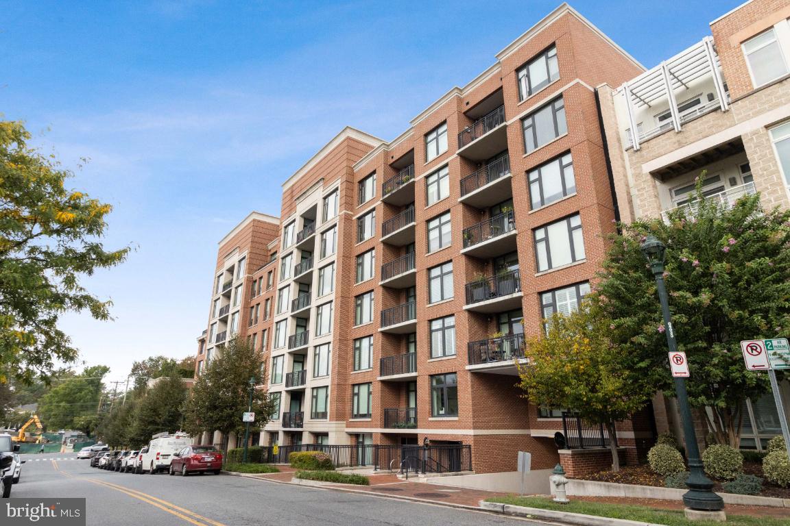 Experience luxury and all that Hampden Row Condominiums has to offer in this sought after downtown Bethesda Condominium. This 2-bedroom, 2.5-bath condo features an open floor plan with floor-to-ceiling windows and is bathed in natural light. The gourmet kitchen includes top-tier appliances, custom cabinetry, an oversized center island with plenty of seating and beautiful white quartz countertops. The primary suite offers a luxurious en-suite bath with dual vanities, a soaking tub, and a spa like shower with rain shower. A second bedroom with its own bath and a stylish powder room for guests add to the comfort. Enjoy a quiet evening overlooking downtown Bethesda from your private balcony with views of the park and downtown cityscape. Experience exclusive amenities like a rooftop fitness center, terrace, and lounge with some of the best views in Bethesda. Two assigned garage parking spaces. Prime location provides easy access to dining, shopping, and entertainment. 24 hour Concierge.