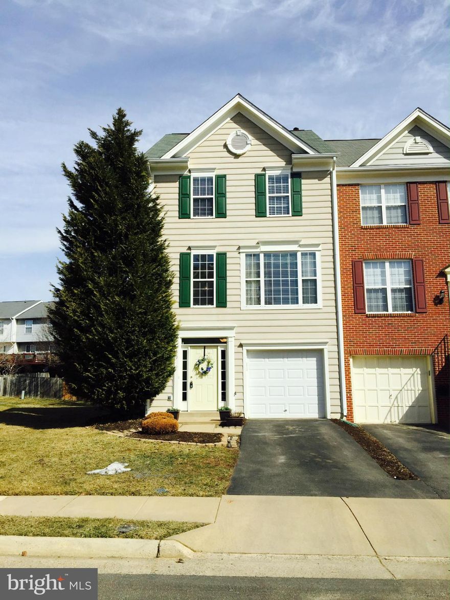 Largest TH in Greenway Farms- This bright end unit Townhome with garage and 3 level bumpout  features 3 Bedrooms and has 2 full baths and 2 half baths. Master Bedroom with sitting room. Backyard with Deck, stone paver patio-fully fenced. Hardwood floors on entire main level. Huge finished lower level recreation room. Excellent condition!