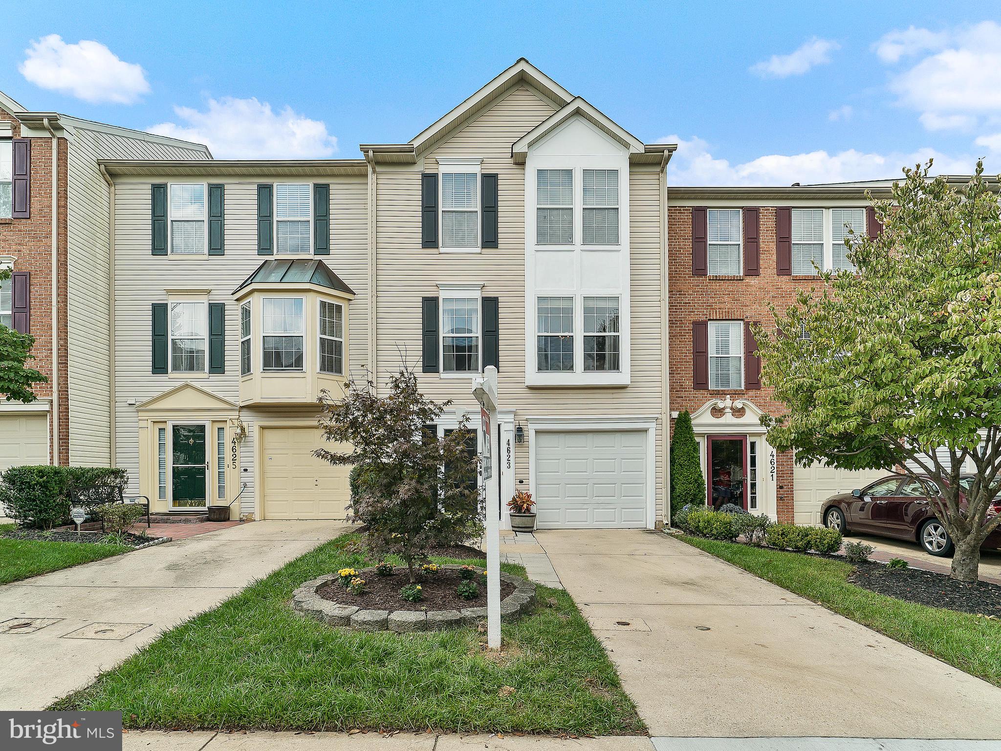 Beautiful 3 level townhouse. Large owners suite w/sitting rm area, lux bath w/double vanity, sep shower & tub andwalk-in closets. Upgrades include granite counter tops, stainless still appliance, center island, hardwood floors on main level.Private deck over looking open space and backs up to amazing tranquil park, stream & walking path. Rec room w/walk out to stone patio. BACK ON MARKET - FINANCING FELL THROUGH