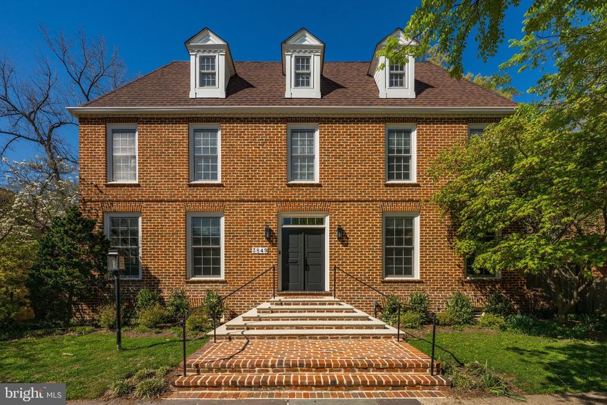 Elegant Williamsburg Colonial tucked within a quiet courtyard in the heart of Cleveland Park. Thoughtfully renovated throughout and expanded 4 years ago to include a top floor primary suite, this home blends classic architecture with high-end modern finishes.

The main level features expansive living and entertaining spaces, including a formal dining room with fireplace, large doorways, and custom window treatments throughout. The family room opens to a chef’s kitchen with a center island with seating, quartz countertops and backsplash, 6-burner gas range with industrial hood, double wall ovens, high-end appliances, and abundant cabinetry. A butler’s pantry with additional sink and beverage coolers connects seamlessly to the kitchen, while the eat-in breakfast area opens to the rear patio. A mudroom with built-ins and a powder room complete the main level.

Upstairs, three additional large bedrooms each with a large closet, including two connected by a Jack-and-Jill bath, plus an additional full hall bath with a second washer/dryer. Sliding barn doors reveal a flexible home office space or additional family room/bedroom on this level.

The top floor addition includes the primary suite with coffered ceiling, spa-like bath with steam shower and double vanity, and a custom walk-in closet and private office with window seat.

The finished lower level provides additional living space, a home gym with mirrored wall and rubber flooring, a bedroom with full wall of built-ins and walk in closet, full bath, laundry room, and ample storage room.

The fenced rear yard is a private retreat with a full-width stone patio, generous green space, and access to a detached one-car garage.  The home comes with one parking spot in front of the house, one garage spot and a multiple spots along the shared gravel driveway as well as easy street parking.

Ideally located near the National Cathedral, a block from the playground and tennis courts, and the Cathedral Common shops and restaurants along Wisconsin Avenue, including Wegmans!