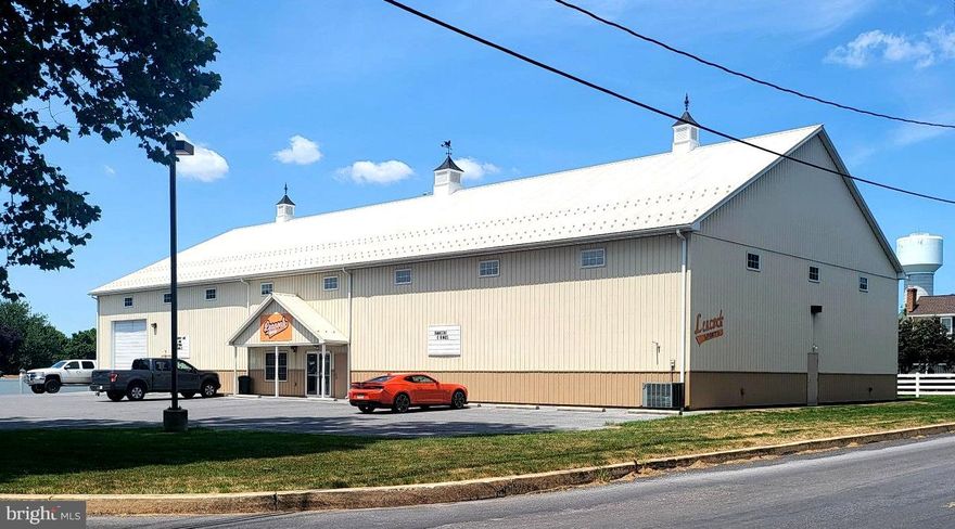 Location Location, looking for an outstanding commercial/retail property in a prime location then this one is for you. With over 12,000 SF of floor space, 3 bathrooms, offices, small lunchroom,  warehouse area with 14x14 overhead door, wood mezzanine that could be removed if you need more high bay warehouse space. Lower retail space with 2nd floor above it, elevator, and wide access stairs to 2nd floor. 400 Amp 3 Phase Electric service, and large paved parking lot with concrete area for horse ties.
This property is ideal for businesses seeking a central location with ample space and versatile features. Don't miss this opportunity to establish or grow your business in the heart of it all!