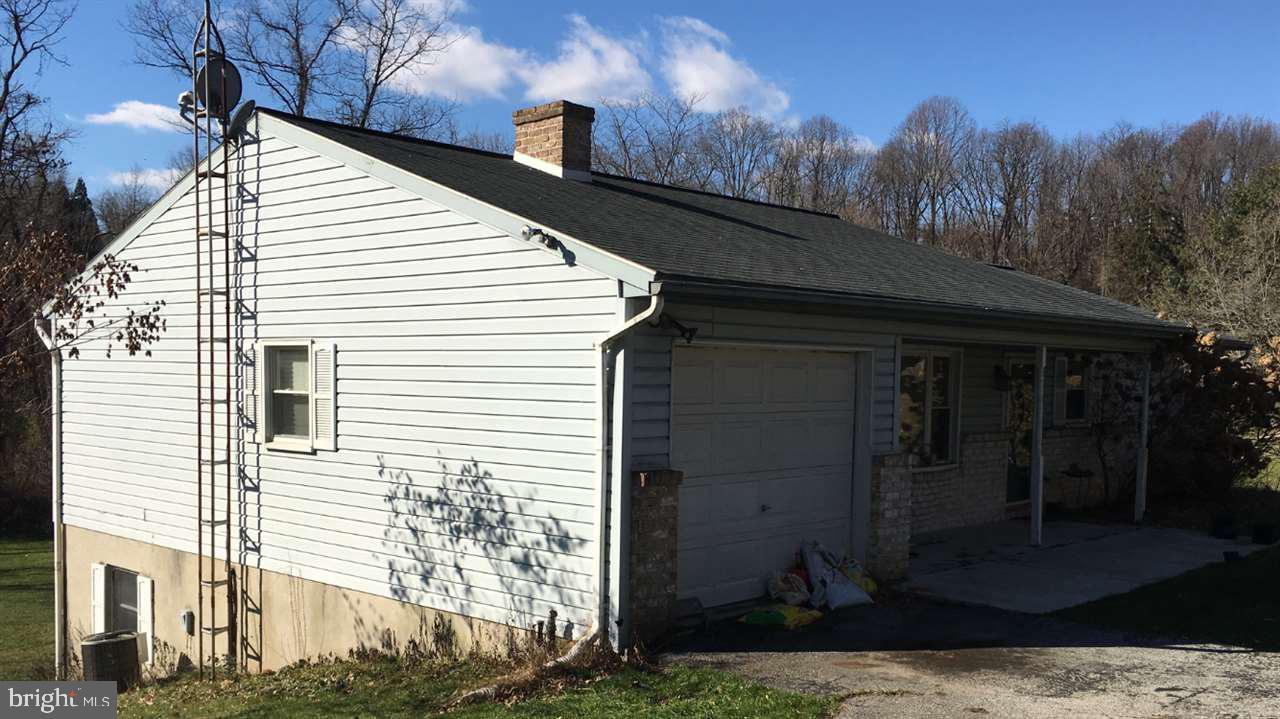 Completely renovated with new custom kitchen, new stainless steel appliances, finished walk out basement, rear deck and 2 (1) car garages.