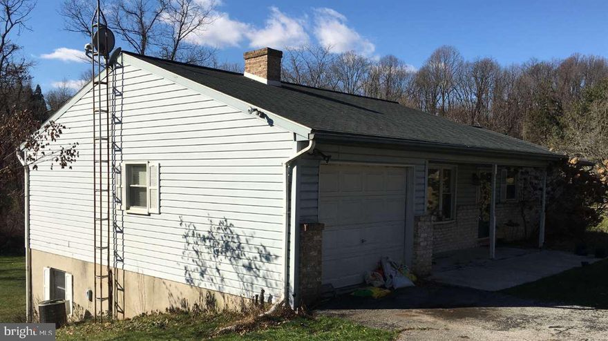 Completely renovated with new custom kitchen, new stainless steel appliances, finished walk out basement, rear deck and 2 (1) car garages.