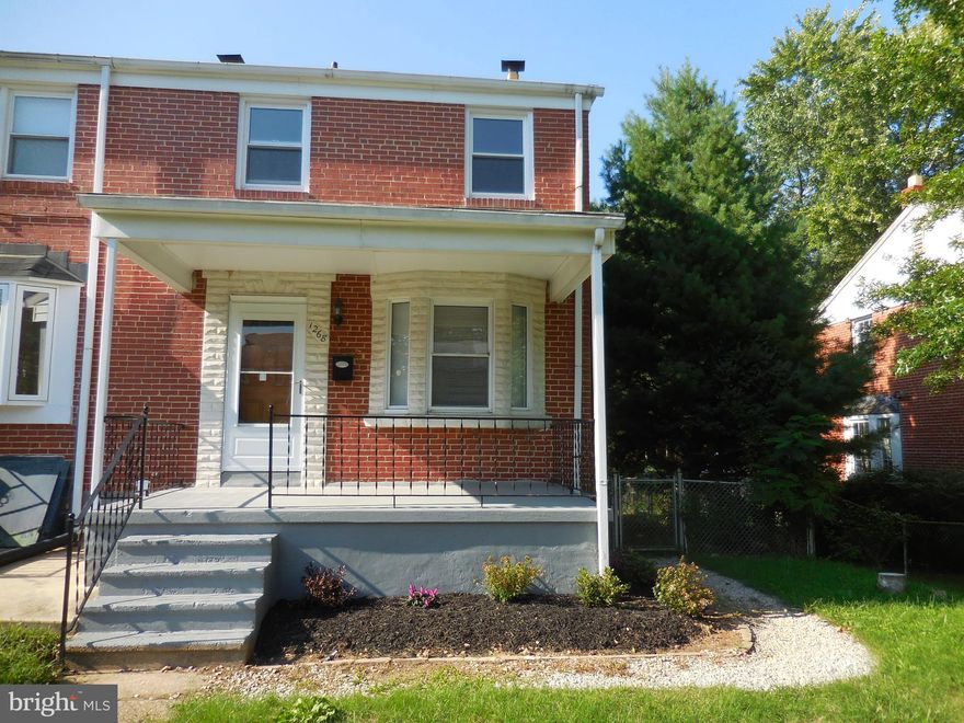 This end of the group features lots of upgrades. Hardwood floors, granite countertops, finished basement, Central Air, lots of natural light beaming throughout the entire home.
