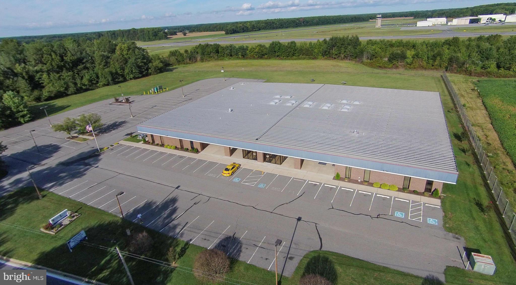 Professional office building in the Easton Airport Industrial Park. 28,500 sq.ft. on 5 acres. Flexible floor plan allows for easy expansion or conversion for multiple tenants. Quick, convenient Rt. 50 access and the Easton airport. Layout offers multiple cubicle areas, private offices, large & small conference rooms, employee cafeteria & kitchen, IT room, data center, mail room and more.