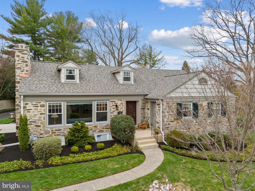 Enjoy the ease and charm of living in this WALK-TO-WAYNE 4/2.1 Cape Cod, offering a seamless blend of comfort and functionality, with a spacious First Floor Primary Suite, first floor laundry, and convenient first floor garage inside access—all situated on one of the most desirable streets, Louella Avenue, in the coveted neighborhood of South Wayne. 
The first floor opens with an inviting entry foyer that leads to the main hallway, kitchen, and formal Living Room. The Living Room features a wood-burning fireplace with a classic mantel, Sun-filled picture windows, crown molding, a built-in bookcase, and access to the side patio. The formal Dining Room includes chair rail, crown molding, hardwood floors, and large picture windows overlooking the side patio and private driveway. The modern island kitchen boasts quartz countertops and tile back splash, stainless steel appliances, recessed lighting, and a breakfast bar that opens to the cheerful Breakfast Room. Bathed in natural light, this sunny space is adorned with raised ceilings, floor-to-ceiling windows and French doors, offering a stunning 180-degree view of the pool and lush backyard gardens. You'll also find a cozy Den with built-in bookcases with access to the front patio, a spacious Powder Room with a convenient adjoining laundry room. The corner First Floor Primary Suite includes a walk-in closet, built-in display case, and an en-suite bathroom with double sinks, a new whirlpool tub, and a brand-new tiled shower with a seat and framed shower door.
Ascend to the second floor, where you'll find three additional bedrooms, a full bathroom with double sinks, and two sets of hall closets for fantastic storage solutions. The finished daylight basement is the perfect Family Room, complete with recessed lighting and carpeting, alongside an adjoining unfinished area for additional storage.
The home rests on a manageable .37-acre lot, the fenced backyard is a private oasis with a heated pool as its centerpiece, complemented by a slate patio and decking, gardens and a classic stone front façade. A private driveway with a handy turn-around leads to the 2-car garage, which is fitted with a new Clopay garage door. Thoughtfully maintained, this property features newer fiberglass tilt-in windows, updated HVAC, a new roof, a recently installed chimney liner and crown, enhanced insulation, and a Pro Via front door. 
Situated in one of the most convenient Main Line neighborhoods, this property is just minutes from the Radnor Trail entrance, downtown Wayne’s lively shops and restaurants, SEPTA’s R5 train to Center City Philadelphia, major commuting routes to Philadelphia Airport, and the highly acclaimed Radnor Schools, as well as prestigious private educational institutions and clubs. This home offers an unbeatable combination of prime location convenience and the comfort of a first floor living lifestyle.