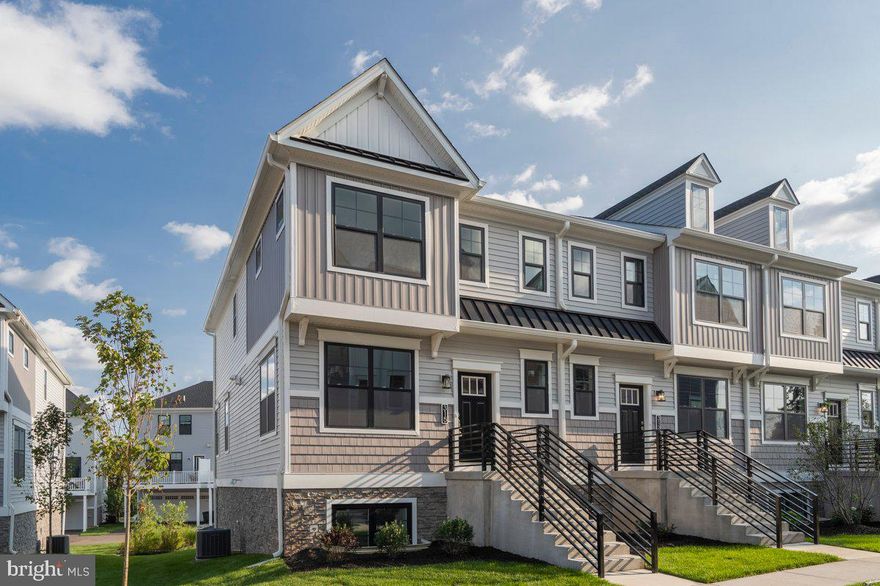 Upscale design, downtown lifestyle in the heart of Collegeville! This new construction Kinsley End Unit was built by W.B. Home. You'll appreciate the attention to detail and quality construction found inside and out.  At first glance of the impressive contemporary architecture, you'll notice that this home offers 2 stories, a finished lower level of living, a convenient 2-car garage, and exterior deck with privacy fence. Upon entering the home, you're introduced to the open-concept main living level with airy 9' ceilings and hardwood in the foyer and kitchen. The star of the show is the central kitchen which includes polished granite countertops, an oversized island, furniture-grade cabinetry, and GE stainless steel appliance package including a self-cleaning gas oven & range, microwave, Energy Star rated dishwasher, and garbage disposal. Nearby, the spacious dining room offers a place to sit down and enjoy your culinary creations with plenty of natural light to fill the space. On the other side of the kitchen, the comfortable great room is the perfect place to unwind and offers access to the exterior composite deck. Moving up to the 2nd floor of the home, the private owners suite featuring a large walk-in closet, secondary closet, and luxurious owners bath with spacious walk-in shower, dual sink vanity and designer ceramic tile throughout. Also found on this level of the home are two secondary bedrooms, a full hall bathroom with a designer tile package, spacious hall closet, and laundry area. The fully finished lower level which offers a flexible space for a home office or secondary entertaining area, along with ample storage space and access to the 2-car garage. Further features of this home include W.B. Homes Connect package, extensive lighting package, and more! On top of its impressive interior features, this home is located within the borough of Collegeville, where homeowners will enjoy a walkable neighborhood setting with convenient access to everything the borough has to offer, such as the live music, dining, and beer garden found across the street at Troubles End Brewing, Kimberton Whole Foods, Collegeville Community Park, trailhead access to the Perkiomen Trail & Perkiomen Creek, and the richness of Ursinus College's music, art, theater, lecture, film, and athletics programs. Or, if you're in the mood to explore a little further, the opportunities are endless. Just a short drive away is Providence Town Center (5 min.), access to Rt 422 (5 min.), Evansburg State Park (10 min.), downtown Phoenixville (11 min.), the King of Prussia Mall (17 min.), the Philadelphia Premium Outlets (18 min.), and so much more. This neighborhood is also located within the acclaimed Perkiomen Valley School District and offers carefree living with lawn care, landscape maintenance, trash removal, and snow removal of common areas included through the community HOA!  Professional  Photos will be uploaded.