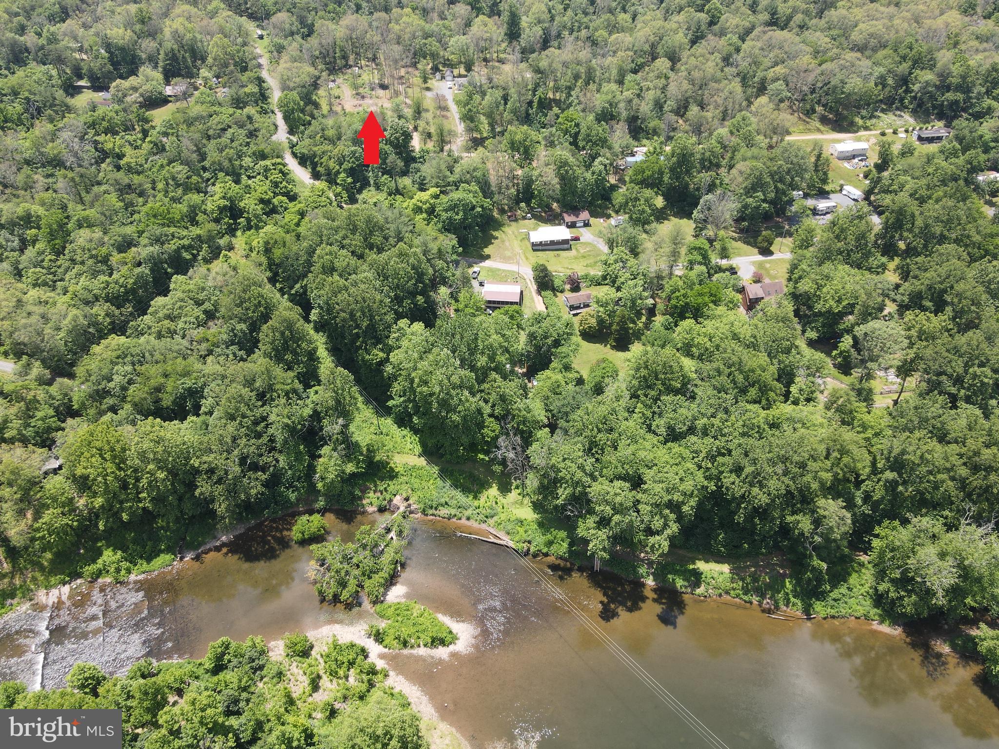 Come build your dream home or bring your trailer/mobile and camp out on this 1.28 acre lot. A VERY short distance and nearly a straight shot from this lot to the community access lot on the Cacapon river! Great place to build your home and enjoy the views of the ridgelines and mountains in the distance. Deed mentions HOA restrictions but the HOA is no longer in place, no HOA fee, no rule enforcement! Come build what you want!