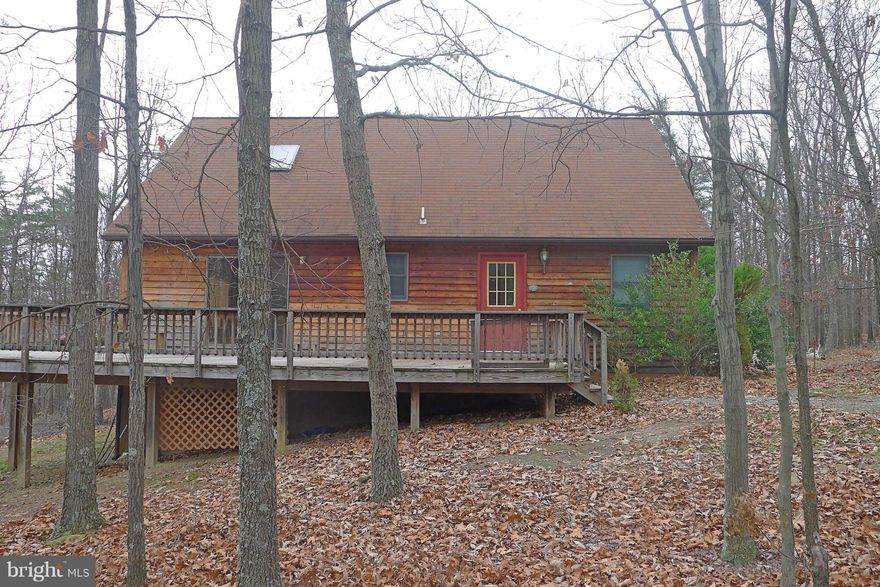 Contract fell thru--frozen pipes so home needs some repair. Appraised in current condition at $134K. Perfect Get-A-Way-Cozy and Private in wooded setting on 6.37 acres. Great layout with big mstr BR upstairs w/sitting area and private bath. Other 2 BRs + full bath downstairs. Great property-Worth the effort. Bank approved price--should be quick.