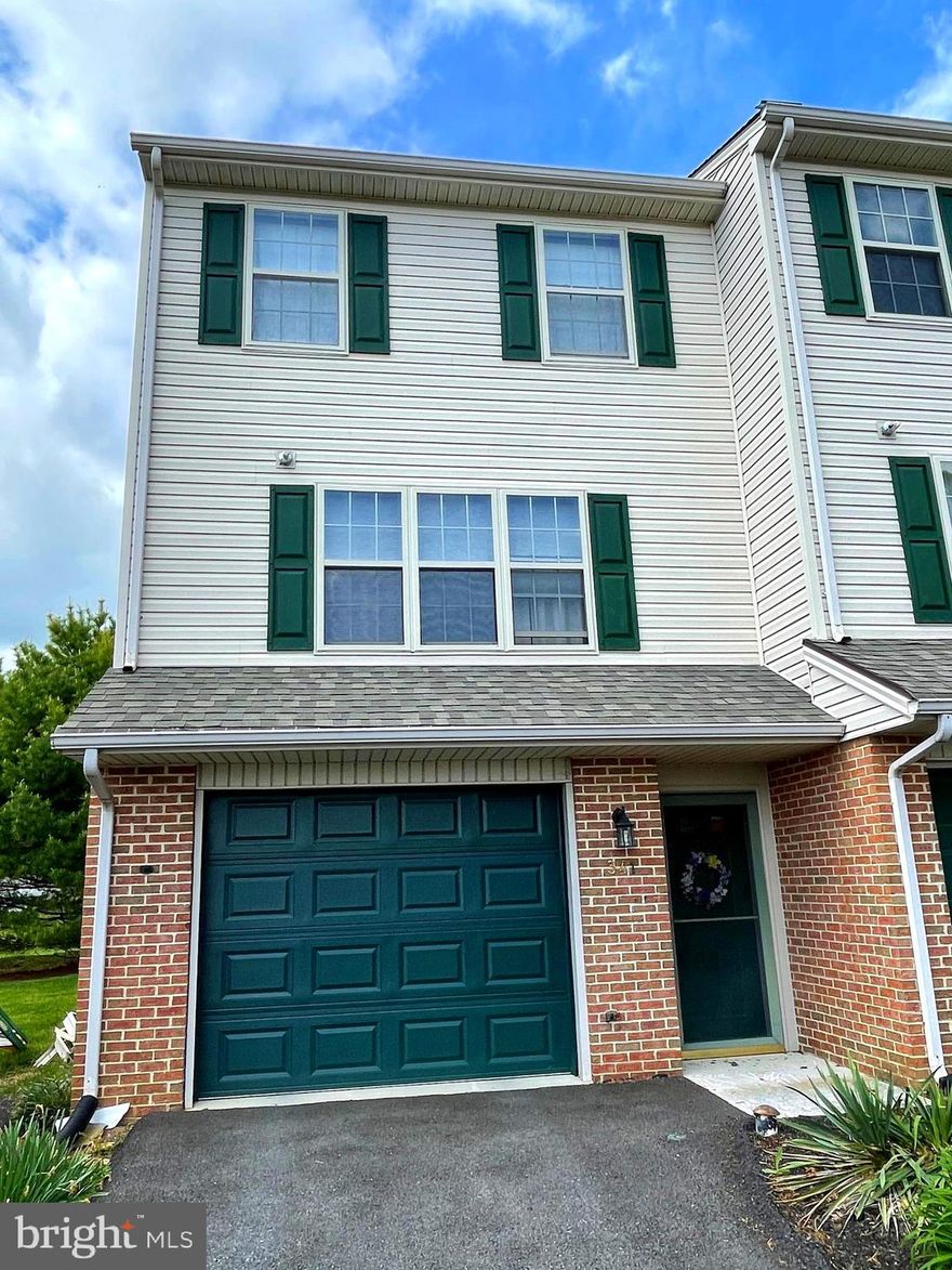 This cozy 3 story row home is a much desired end unit located of 74S and in very close proximity to Rt 24 in the Red Lion School District. It is close to shopping, restaurants, parks and many other businesses. The parking lot separates the property from the main road avoiding any through traffic directly in front of home. Convenient private parking space and single garage with storage space in back of the garage on the first level.  The two additional levels feature 2 bedrooms, 1.5 bathrooms and private deck in the back off the kitchen for morning coffees or entertaining and grilling. Central air and heat and Boasting almost 1,100 square feet, this ready to move in condo is all ready for you!! Come see your new home!