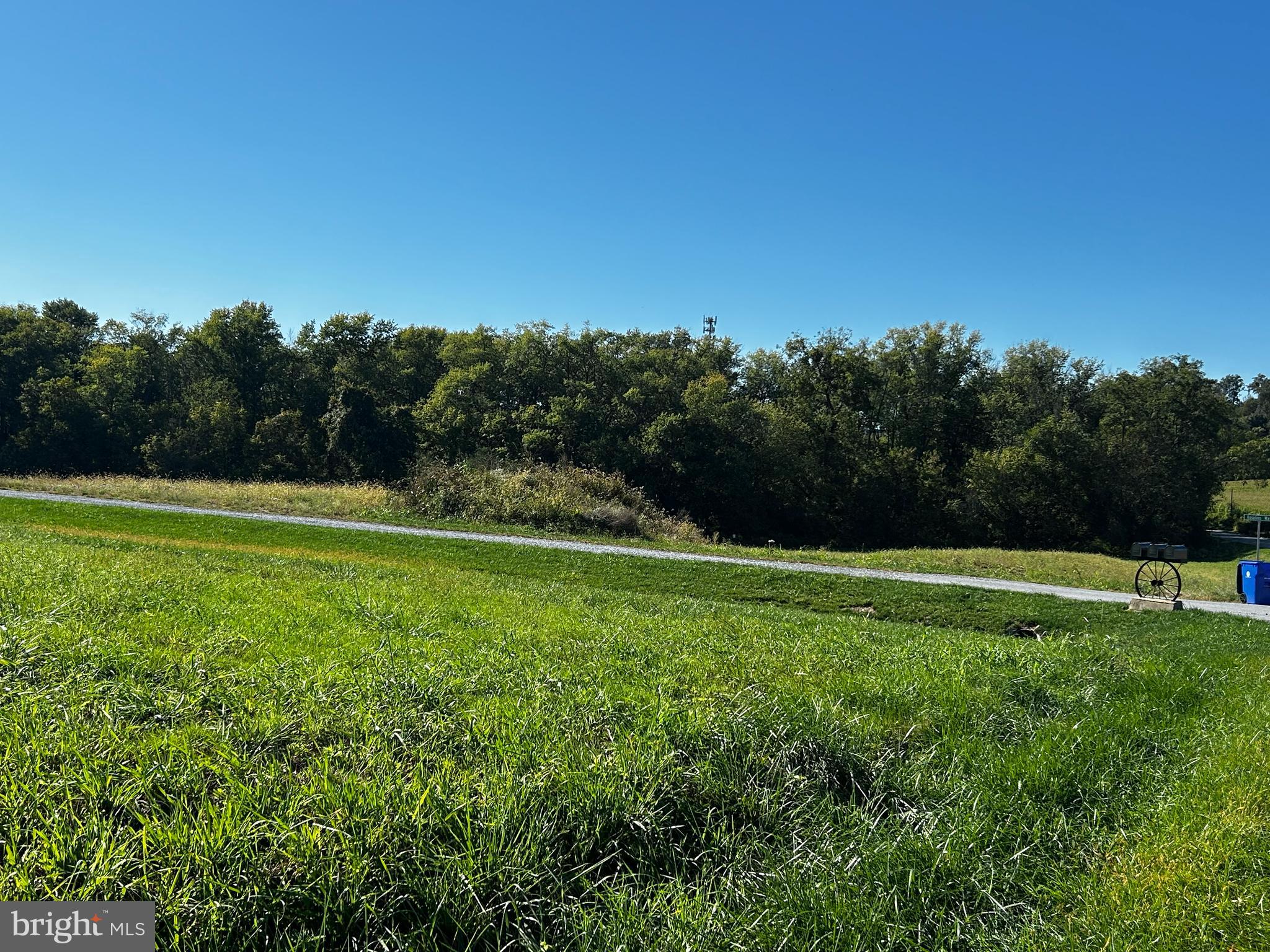 Build Your Dream Home in Scenic Glisan Farms – 7192 Rosalees Way, Frederick, MD 21701 Nestled in the rolling hills of the picturesque Linganore wine region, this stunning cleared lot offers the perfect blend of rural charm and modern convenience. Located just off Old Annapolis Road and minutes from vibrant downtown Frederick, this homesite offers easy access to commuter routes including I-270, while still providing the serenity of country living. Offered by Maryland Heritage Custom Builders, Inc. in partnership with Glisan Farms, Inc., this property is part of a boutique community featuring expansive views, open green space, and thoughtfully placed homes. Property Highlights: Approved for a 4-Bedroom Home; Perc-approved at-grade mound septic system (gravel-based for reduced cost); 600-foot deep private well producing 1.5 GPM; Electric service nearby, with transformer adjacent to the lot; Gently sloping lot, ideal for a walkout basement; Front of house must face shared driveway for uniform aesthetics; Shared driveway maintenance agreement with two neighboring properties; Asphalt apron already in place at the entrance from Old Annapolis Rd; final driveway paving to be completed after the third home is built; No cable access; Starlink internet has worked successfully for neighboring homes; Previously part of a working farm, this lot retains its pastoral charm while offering the infrastructure needed to build a beautiful custom home. Whether you're seeking tranquility, views, or proximity to the region’s best amenities and wineries, 7192 Rosalees Way delivers.