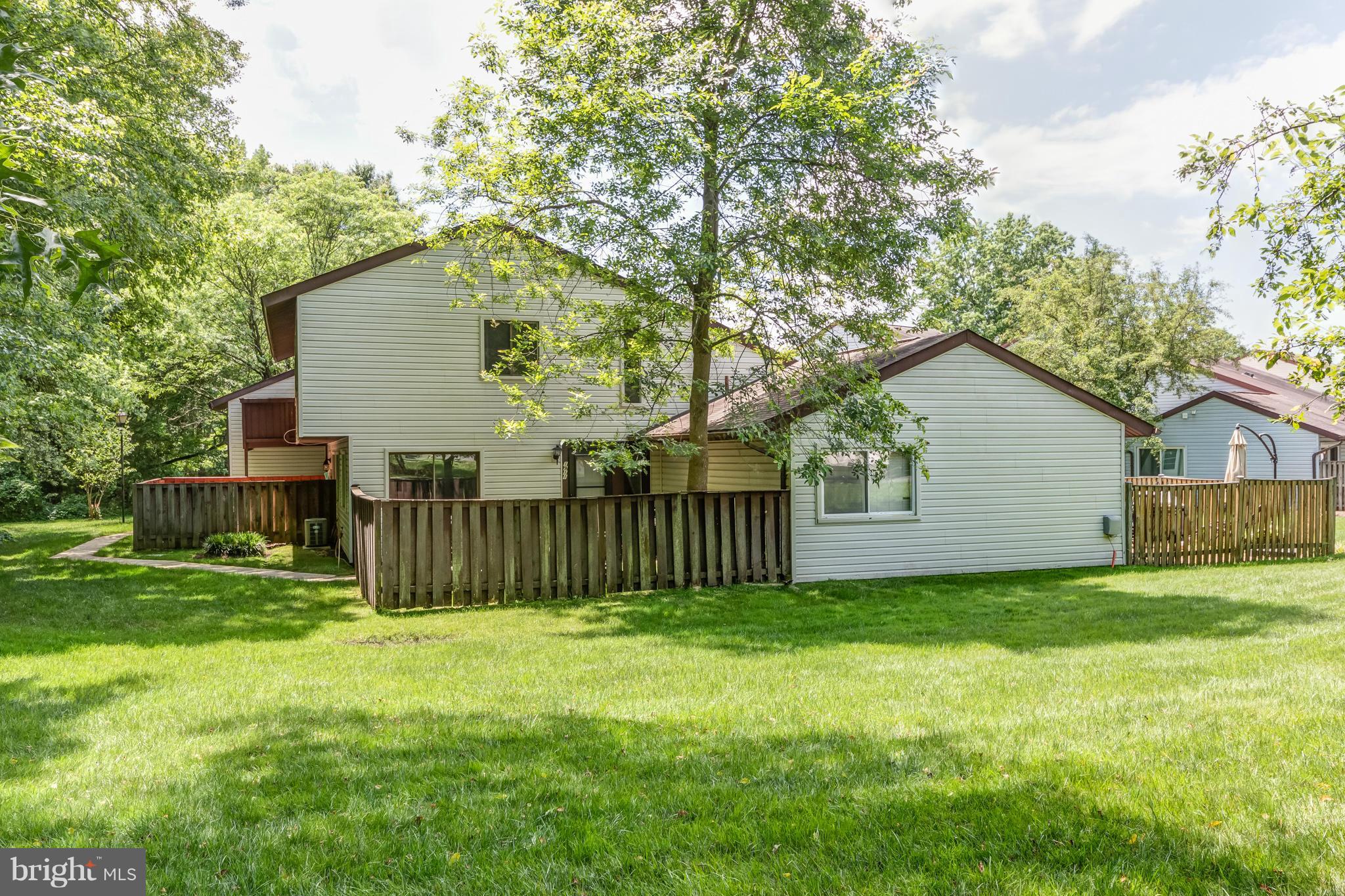 This contemporary Crofton home is move-in ready with hardwood floors, all new paint and carpet, a custom master closet, and state of the art security system! The location also provides a fantastic wooded view, a private location within the neighborhood, and a fenced in patio! A one car garage provides extra storage! Great commute to Ft. Meade and D.C.!