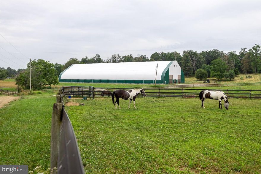 Tucked in the heart of Virginia Horse Country, this 61 acre farm is ready for your personal touches. Surrounded by beautiful views, and just a short drive from DC, this property is the perfect place to build your dream home or just escape from the hustle and bustle of the city. The possibilities are endless with 61 acres that are excellently laid out for horses, sheep, or other livestock. Not only that, but there is an additional 104 acres that have been planted in new pines that come with the property. Imagine living, working, and playing on this one-of-a-kind property with 165 acres to call your own! It includes a MASSIVE AND NEWLY COVERED 100' x 260' indoor riding arena with electricity and water, 48' x 96' barn with electricity and water, 32' x 96' machine shed, 32' x 36' workshop. Flex fencing around paddocks, automatic waterers, 2 DURs, spring-fed pond, mature trees, conservation easements with Virginia Land Trust.