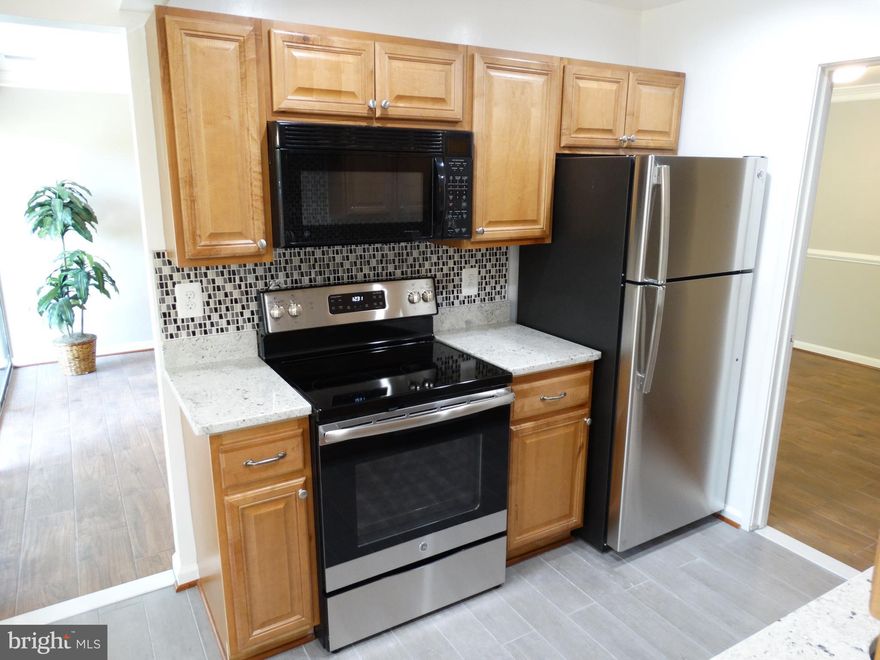 OPEN SUN MAY 6TH 1-4PM*Immaculate Renovation of 2 BR 2 BA Unit* New Kitchen Includes: New Cabinets, New Stainless Steel Appliances, New Granite Countertops, New Ceramic Tile Flooring*All Baths Updated*New Water Heater*New Tile Flooring in LR, DR, Halls and New Carpet in BR's*Fresh Paint throughout*All Ready for New Owner to Move Right In*