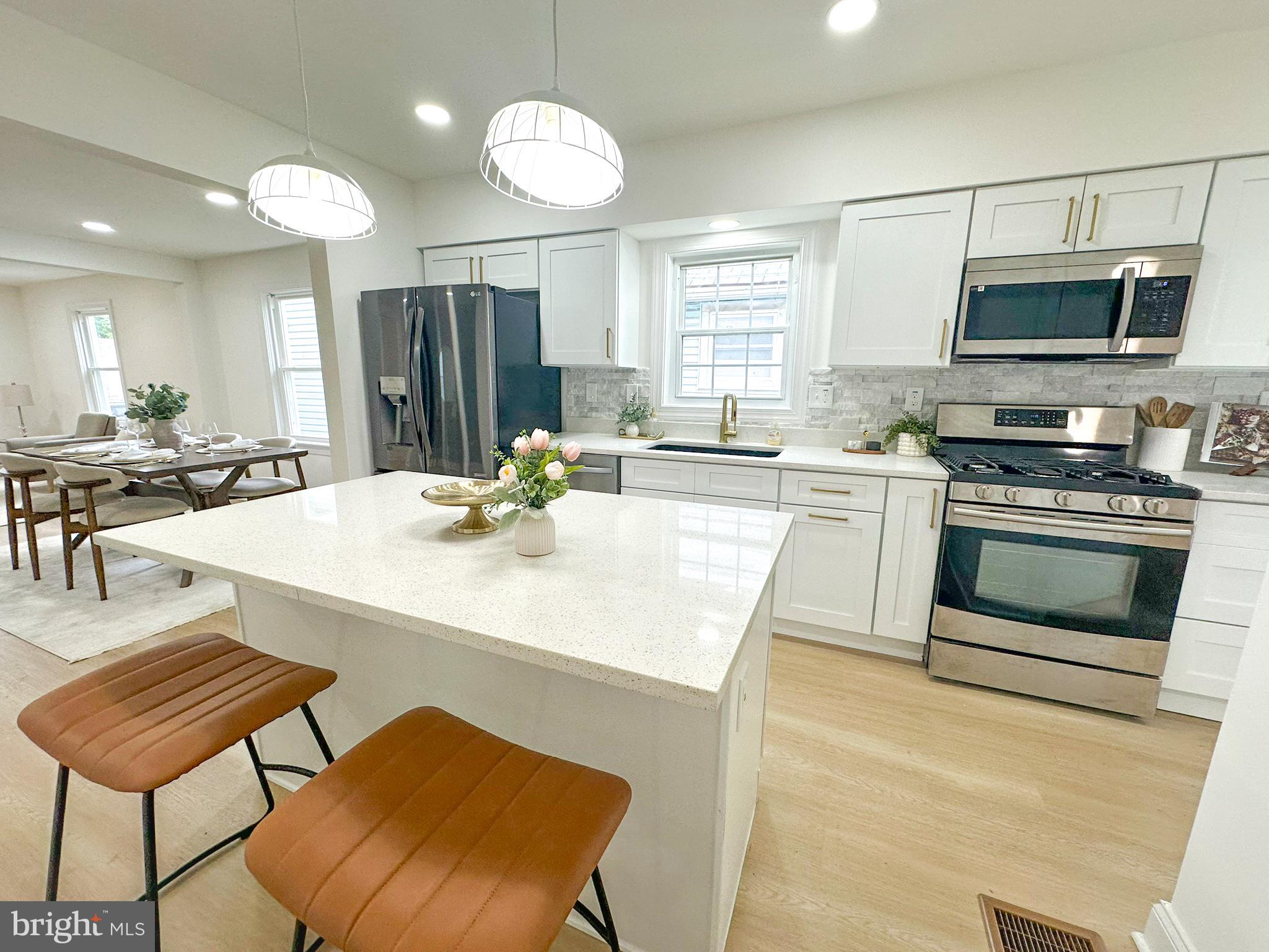 MOTIVATED SELLER - BRING ALL OFFERS - Step into luxury and convenience with this beautifully fully renovated 3-bedroom, 3.5-bathroom single-family home, ideally located near local amenities and with easy highway access for a seamless commute.
Each of the three bedrooms is its own private suite, offering en-suite bathrooms and generous closet space—perfect for guests, family, or creating a personal retreat. The thoughtful layout provides both privacy and functionality, ideal for modern living.
The heart of the home is the brand-new kitchen, featuring sleek, modern design and outfitted with updated appliances—a dream for home chefs and entertainers alike.
Enjoy year-round comfort and energy efficiency with a new roof and windows, bringing peace of mind and added value. Don't miss this rare opportunity to own a move-in-ready home with style & space. Schedule your private showing today and see all that 209 Main Street has to offer.