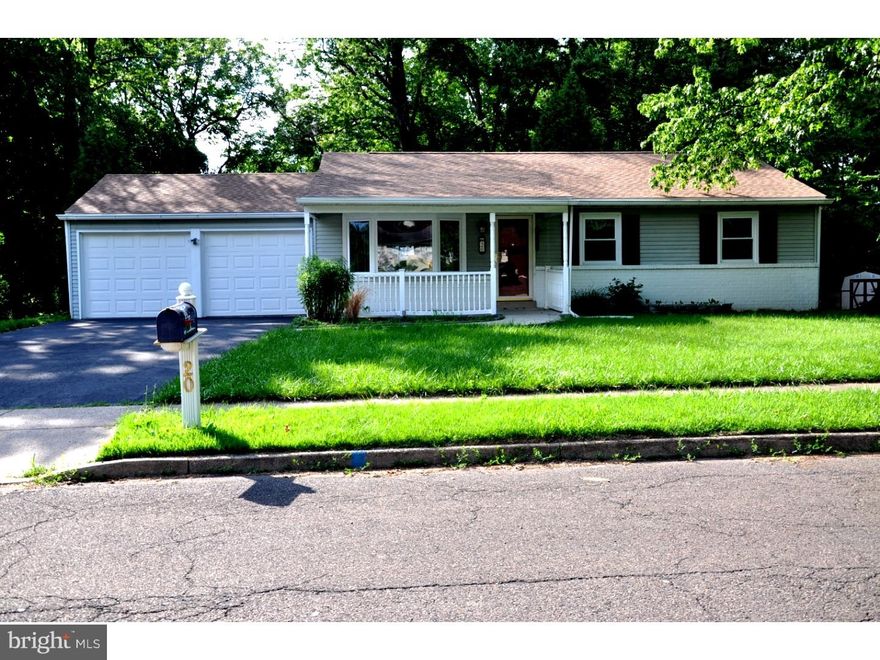 Move right in!! Rarely offered totally updated ranch house situated on a large corner lot on a very quiet street yet close to all the shops, restaurants and major roads. The house is sunny and bright, has a lot of windows and great views. Home features: 3 spacious bedrooms, 2 full contemporary bathrooms with ceramic tile floors, new 2014 roof, refinished hardwood floors, newer central air conditioning, new heating system and water heater, newer windows and doors, sump pump, shed, covered front patio, 2 car garage with plenty of storage. Driveway just re-coated! Freshly painted! There is a sliding door from dining room to covered deck overlooking stream & wooded lot.