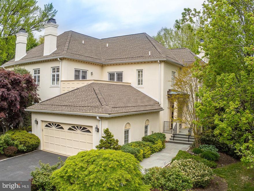 Serenity, space, security and convenience are the hallmarks of this Wrenfield home. Four bedrooms, four full baths, one powder room, and two family rooms on four living levels provide a place for all residents to call their own for work or relaxation.  Packages or luggage? The elevator services three floors and the attached two car garage is just off the kitchen for bringing in groceries.   Sited on the quiet cul-de-sac portion of Oxford Crest.  With travel available again, you will appreciate the convenience of this lock and go lifestyle, exterior maintenance is included with your HOA fee.  THIS IS AND END UNIT WITH ABUNDANT NATURAL LIGHT.  Most of the furniture will be available for purchase outside of an agreement of sale for the home.